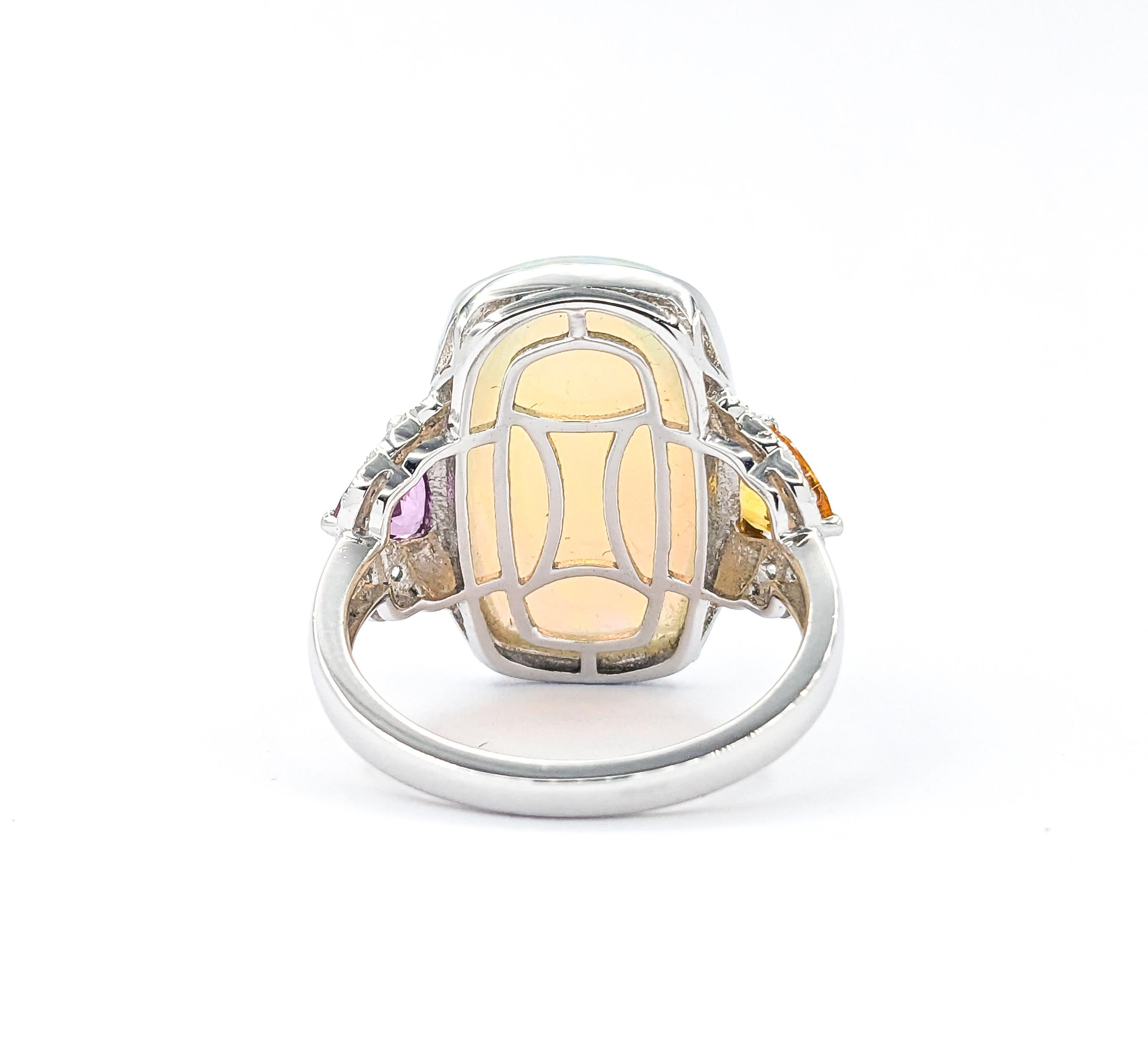 Ring aus Platin mit 8,70 Karat Opal, Cabochon, mehrfarbigem Saphir und Diamant 3