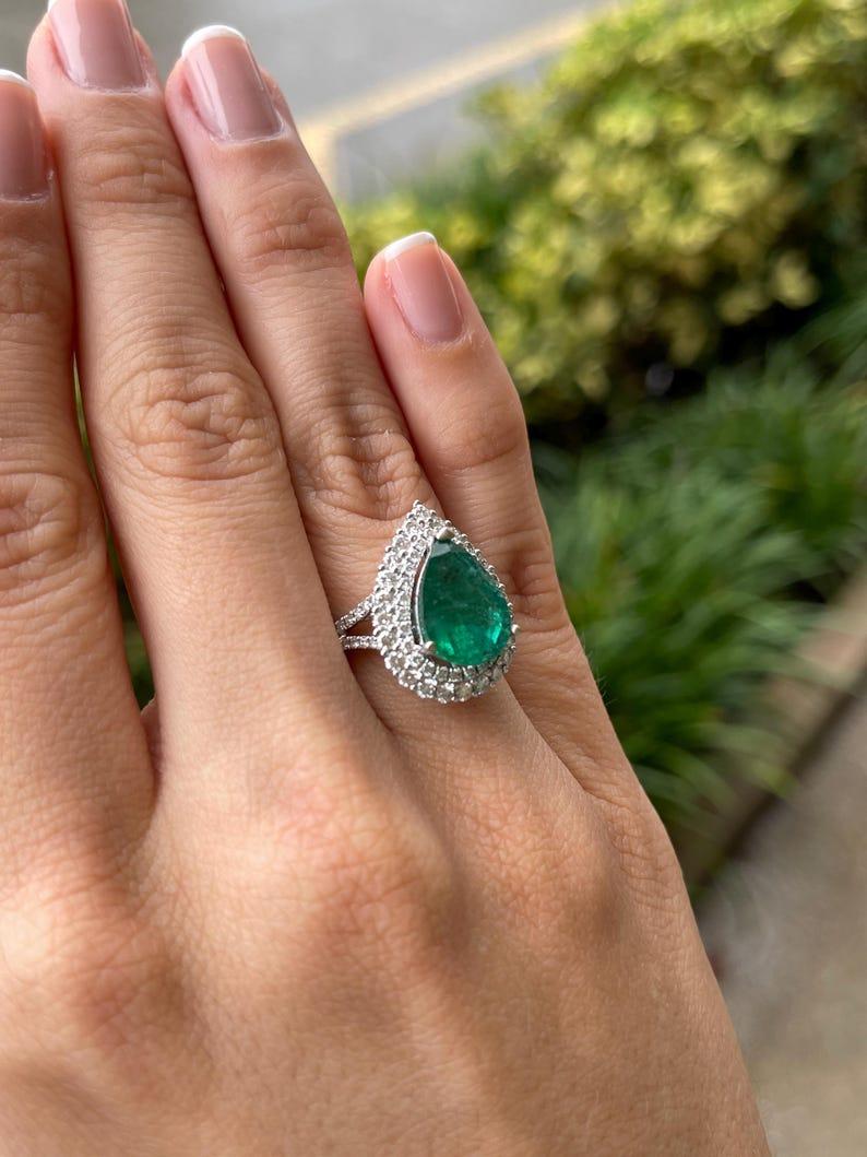 8.70tcw 18K Pear Cut Emerald & Double Diamond Halo Ring - Dark Green 585 Gold In New Condition For Sale In Jupiter, FL