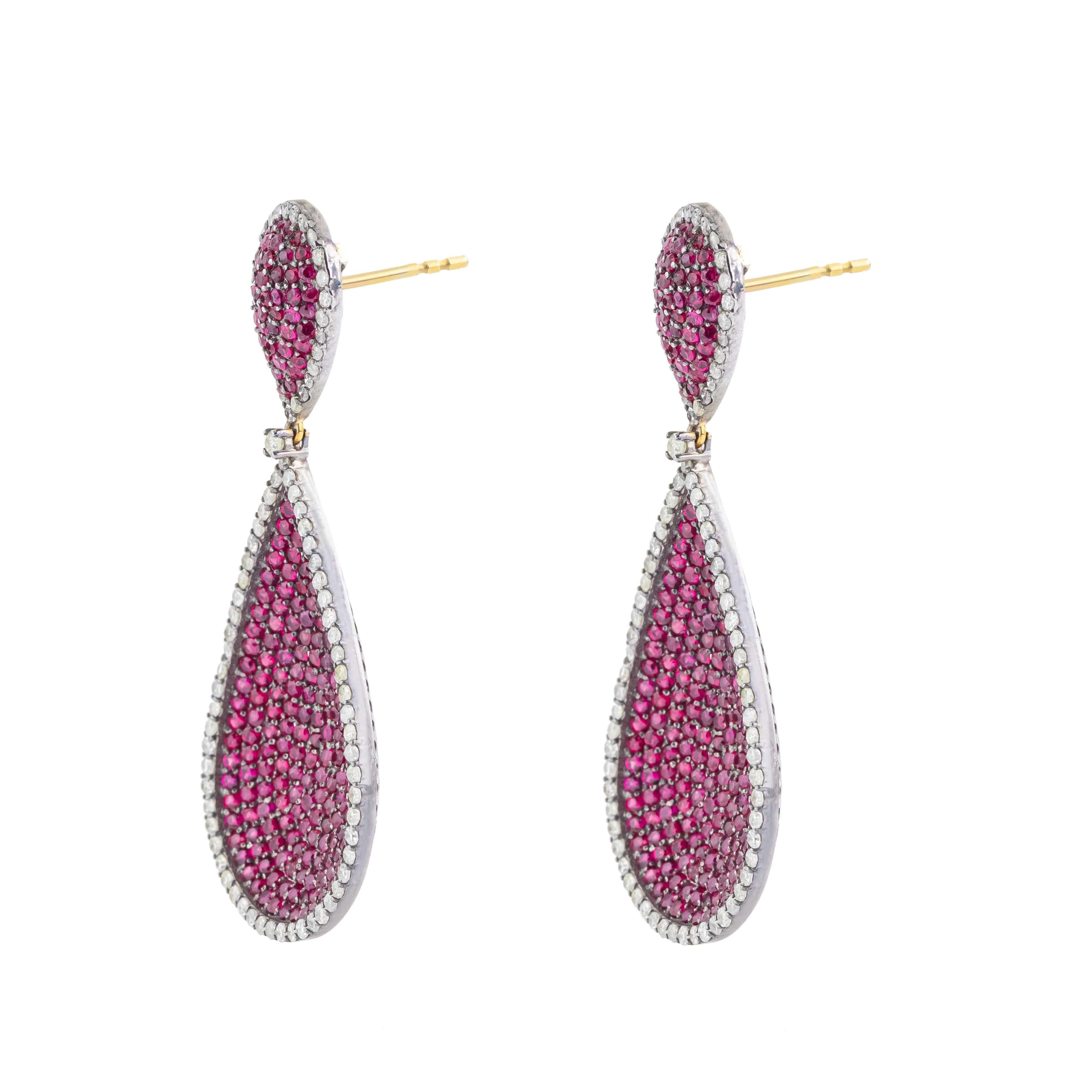 Discover the epitome of elegance with our exquisite 8.71 Carat Diamond and Ruby Fashion Earrings, a testament to meticulous craftsmanship and timeless allure. Each pair is a harmonious blend of sophistication and opulence, designed to captivate