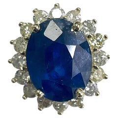 8.71 Carat Intense Blue Oval Cut Natural Sapphire 14K Yellow Gold Diamond Ring