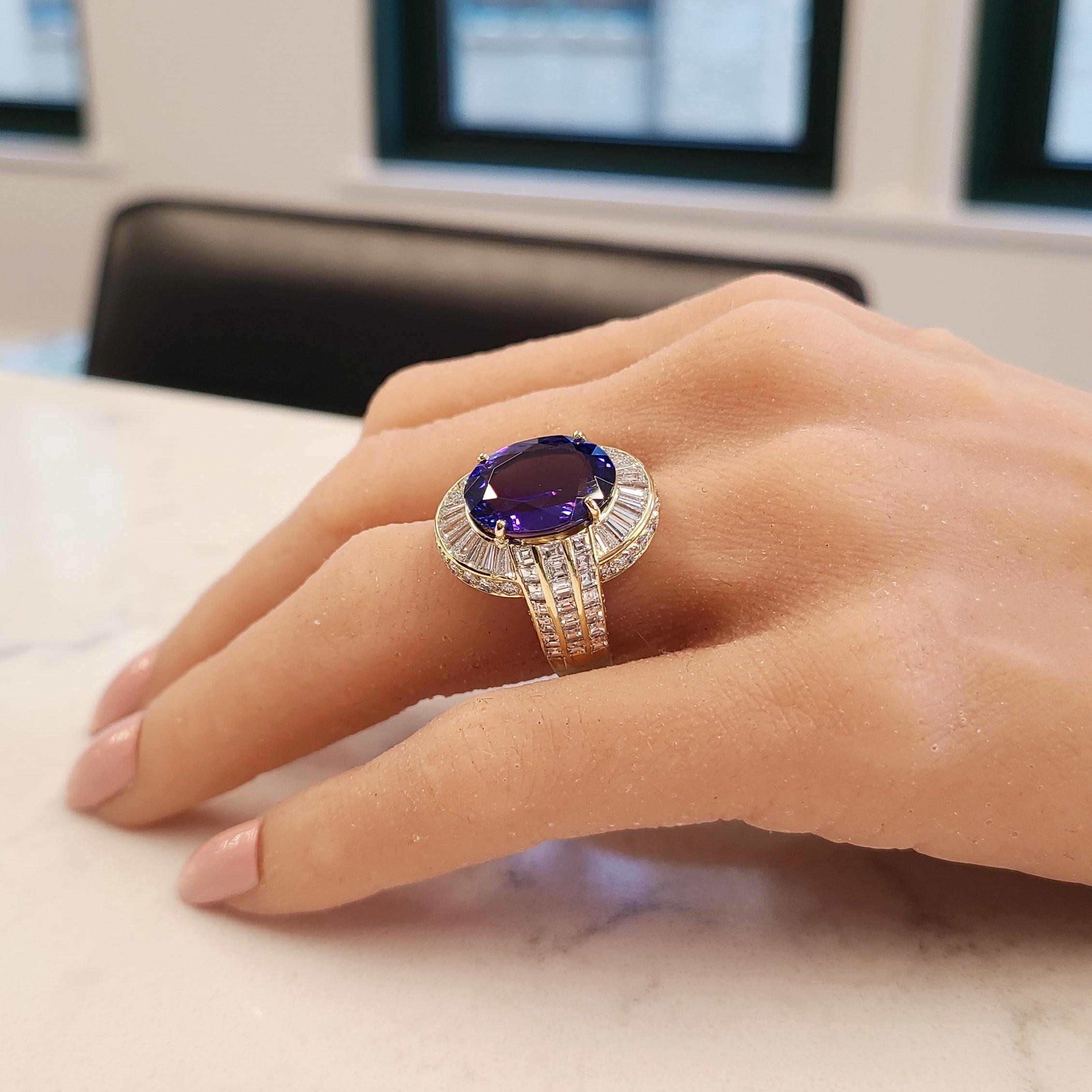Celebrate every day in style with this stunning, brightly polished 18k yellow gold tanzanite diamond ring! This gorgeous ring features an oval cut tanzanite that measures 14.90mmx1090mm and weighs 8.73 carats. This fine quality tanzanite exhibits an