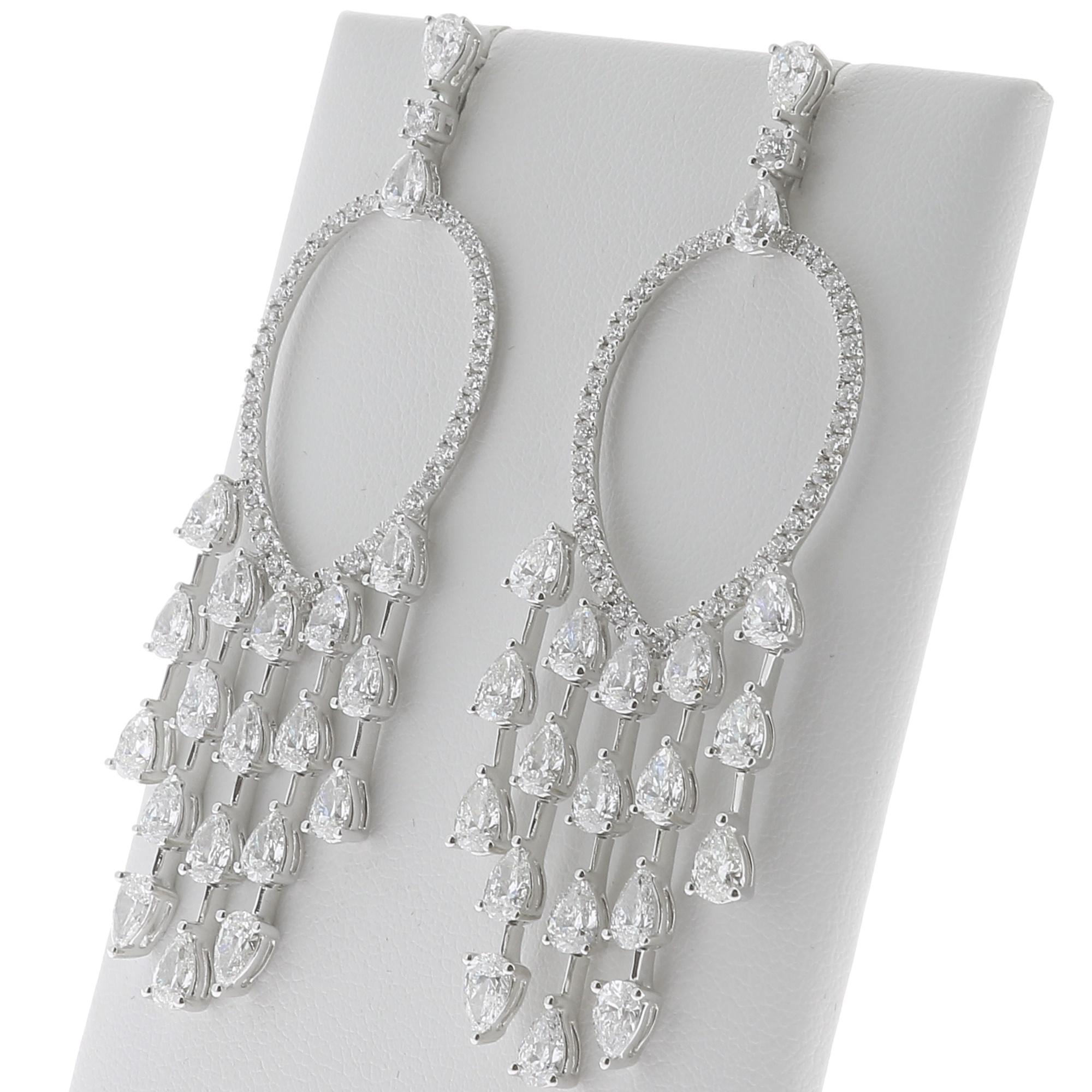 Discover our elegant Diamond Dream Catcher Drop Earrings.
The Diamond Earrings are set with 40 Pear Diamonds and 82 Round Diamonds.
The total pear diamond weight is 7.53 Carats, and the total Round Diamond weight is 1.21 carats.
Totally these