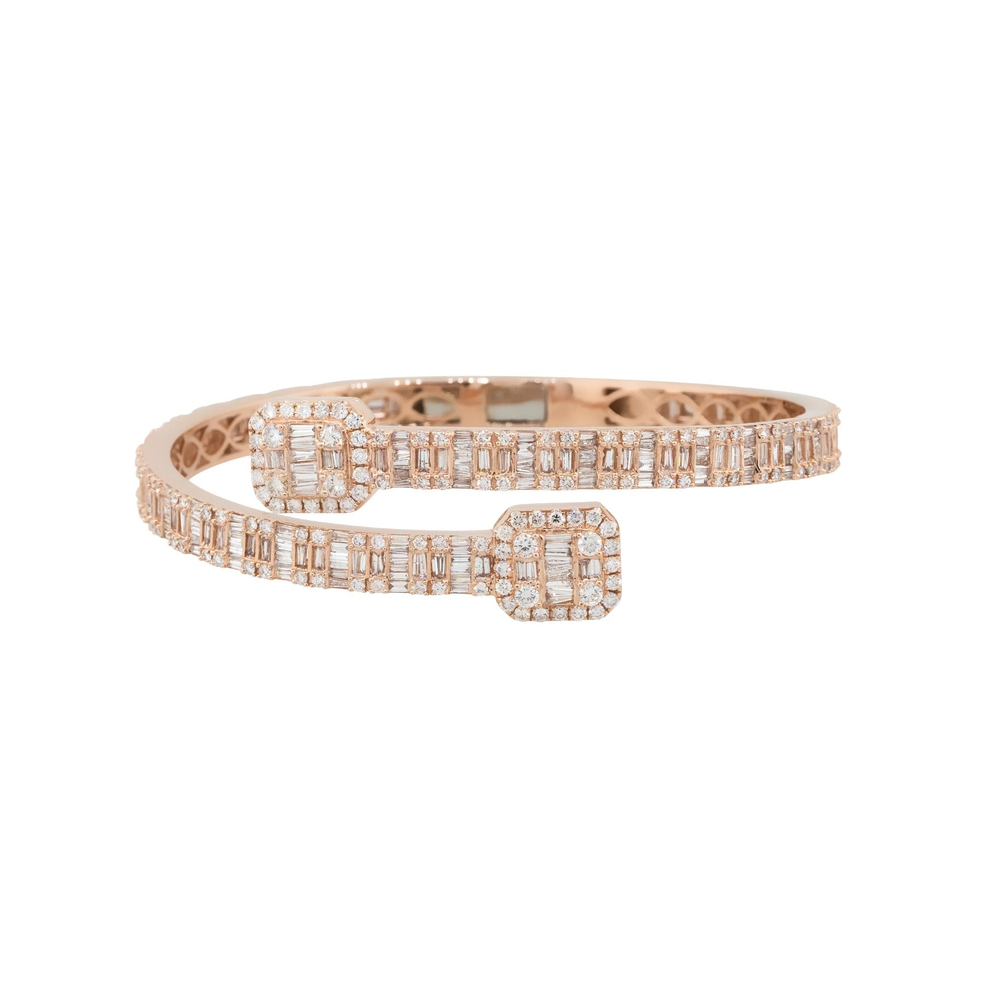 Material: 14k Rose gold
Diamond Details: Approx. 8.75ctw of round and baguette cut Diamonds. Diamonds are G/H in color and VS in clarity
Measurements: 64mm x 14.5mm x 57mm
                           Will fit up to a 8
