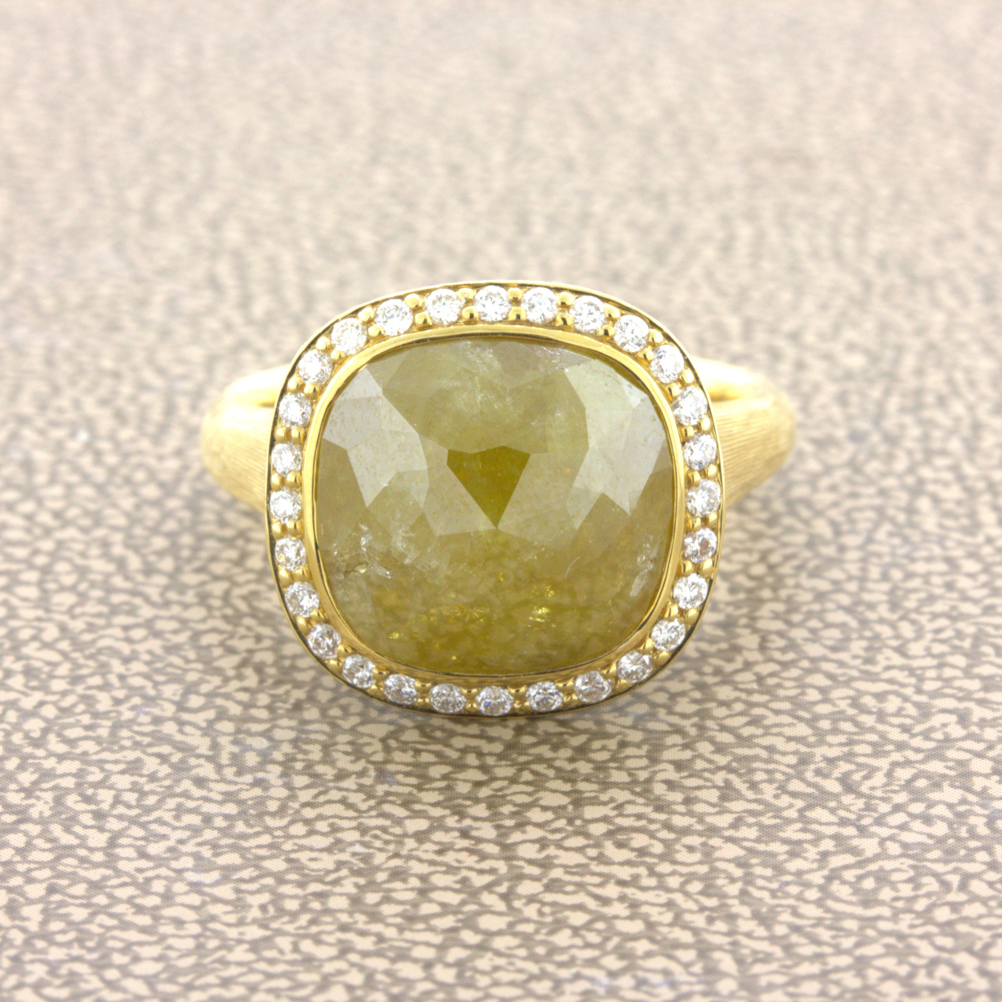 A chic and elegant gold ring featuring a 8.75 carat rose-cut diamond in its center. It has a fancy deep-yellow color along with a unique rose-cut that pops out of the setting. It is haloed by 0.27 carats of round brilliant-cut diamonds. Made in 18k