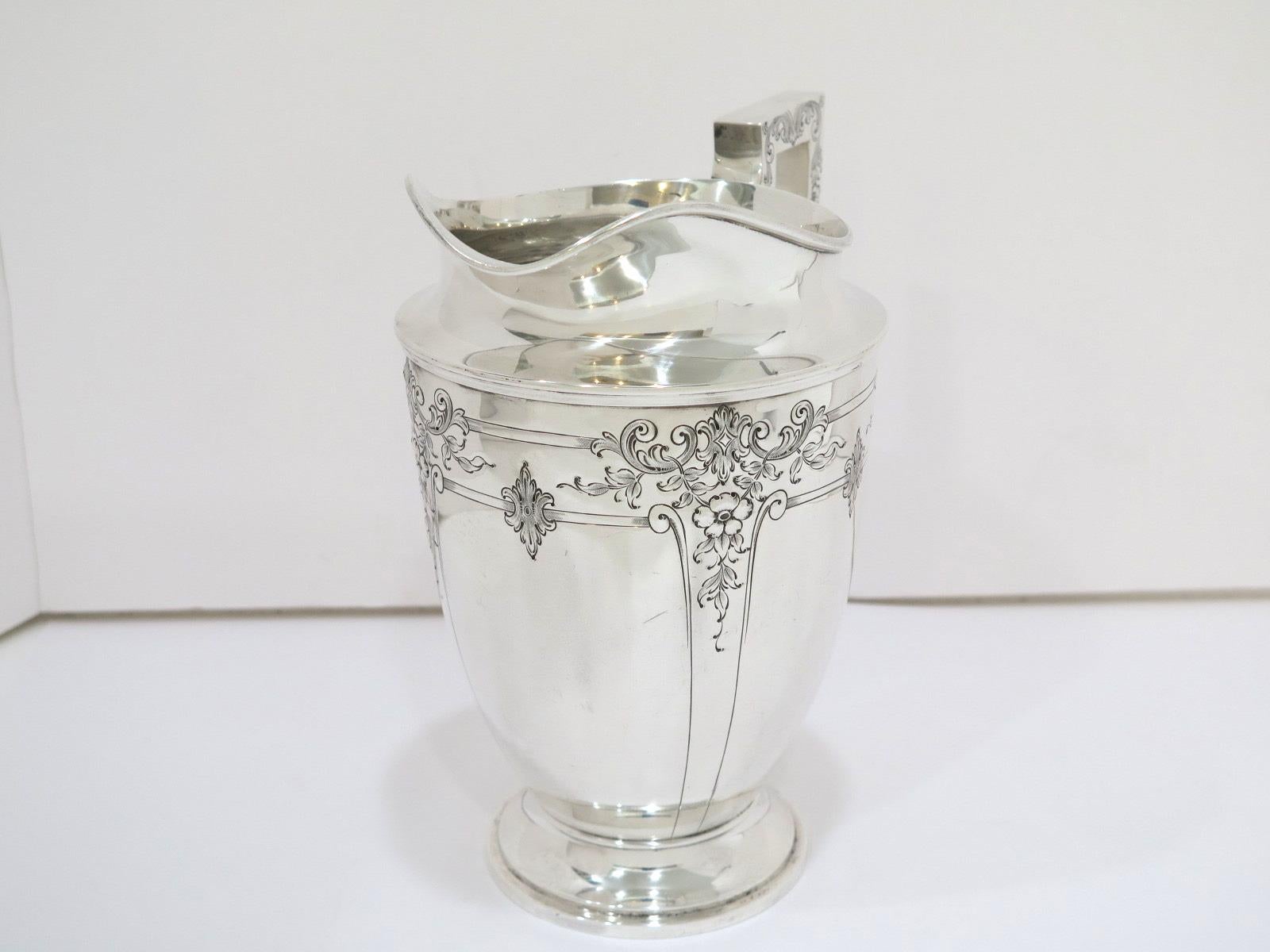 American 8.75 in - Sterling Silver International Sterling Antique Floral Pitcher