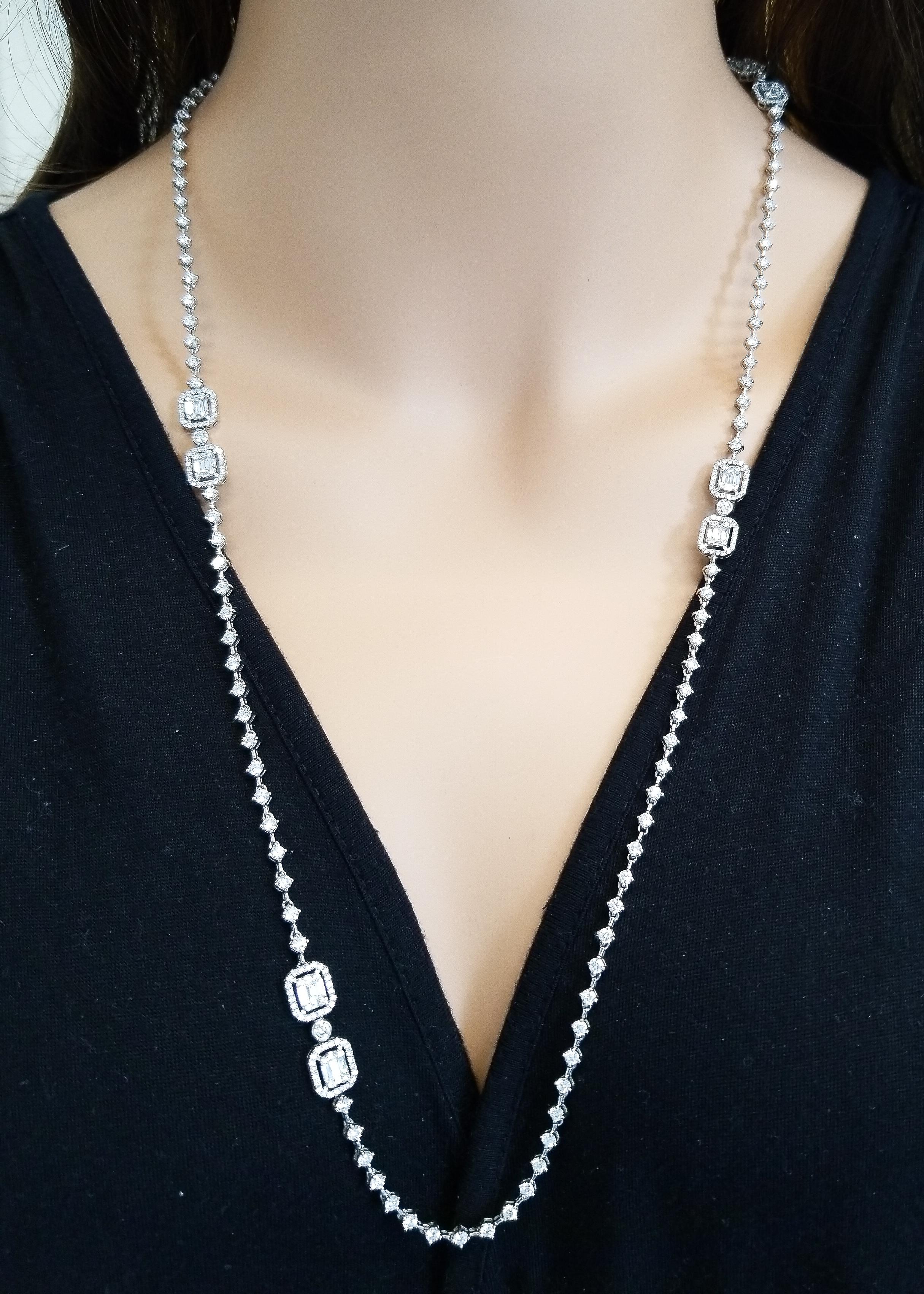 Two layering strands of diamond decadence make this stunning art deco necklace. Round brilliant cut diamonds adorn both strands in round shaped links totaling 7.50 carats. Shimmering baguette cut diamonds are jauntily set in intervals on both