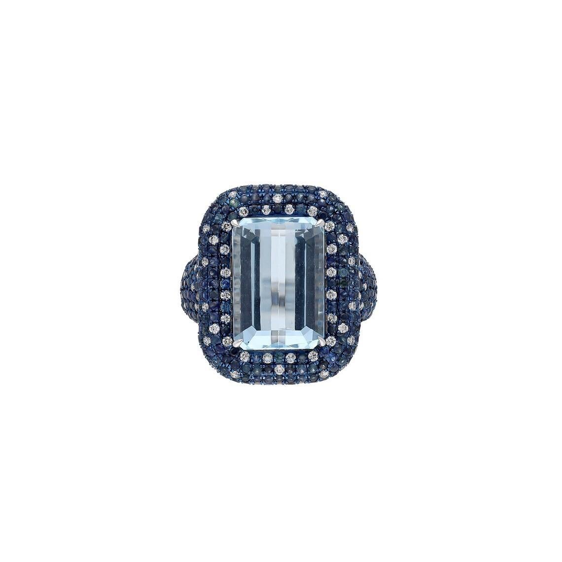 This stunning ring has been crafted from 18-karat gold. It is hand set with 8.77 carat Aquamarine, blue sapphire and 2.50 carats of sparkling diamonds. 

The ring is a size 7 and may be resized to larger or smaller upon request. FOLLOW  MEGHNA