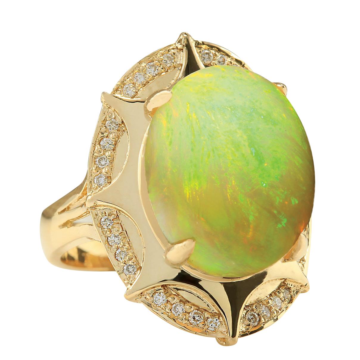 8.77 Carat Natural Opal 14 Karat Yellow Gold Diamond Ring
Stamped: 14K Yellow Gold
Total Ring Weight: 9.3 Grams
Total Natural Opal Weight is 8.52 Carat (Measures: 16.00x12.00 mm)
Color: Multicolor
Total Natural Diamond Weight is 0.25 Carat
Color: