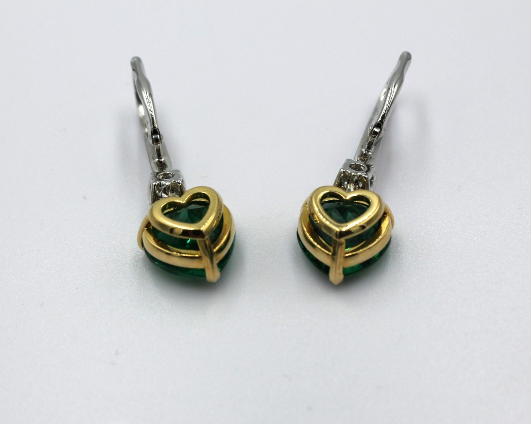 Women's 8.79 Carats Heart-Shaped Emerald & Diamond Earring For Sale