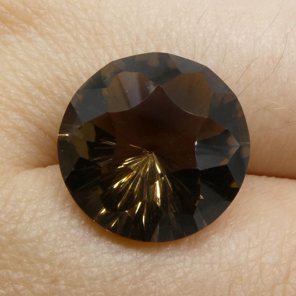 Description:

Gem Type: Smoky Quartz
Number of Stones: 1
Weight: 8.7 cts
Measurements: 14x14x8.50 mm
Shape: Round
Cutting Style: Fantasy Cut
Cutting Style Crown: Modified Brilliant
Cutting Style Pavilion: Mixed Cut
Transparency: Transparent
Clarity: