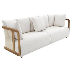 Aiby Sofa with a Teak Frame featuring Cane-Siding