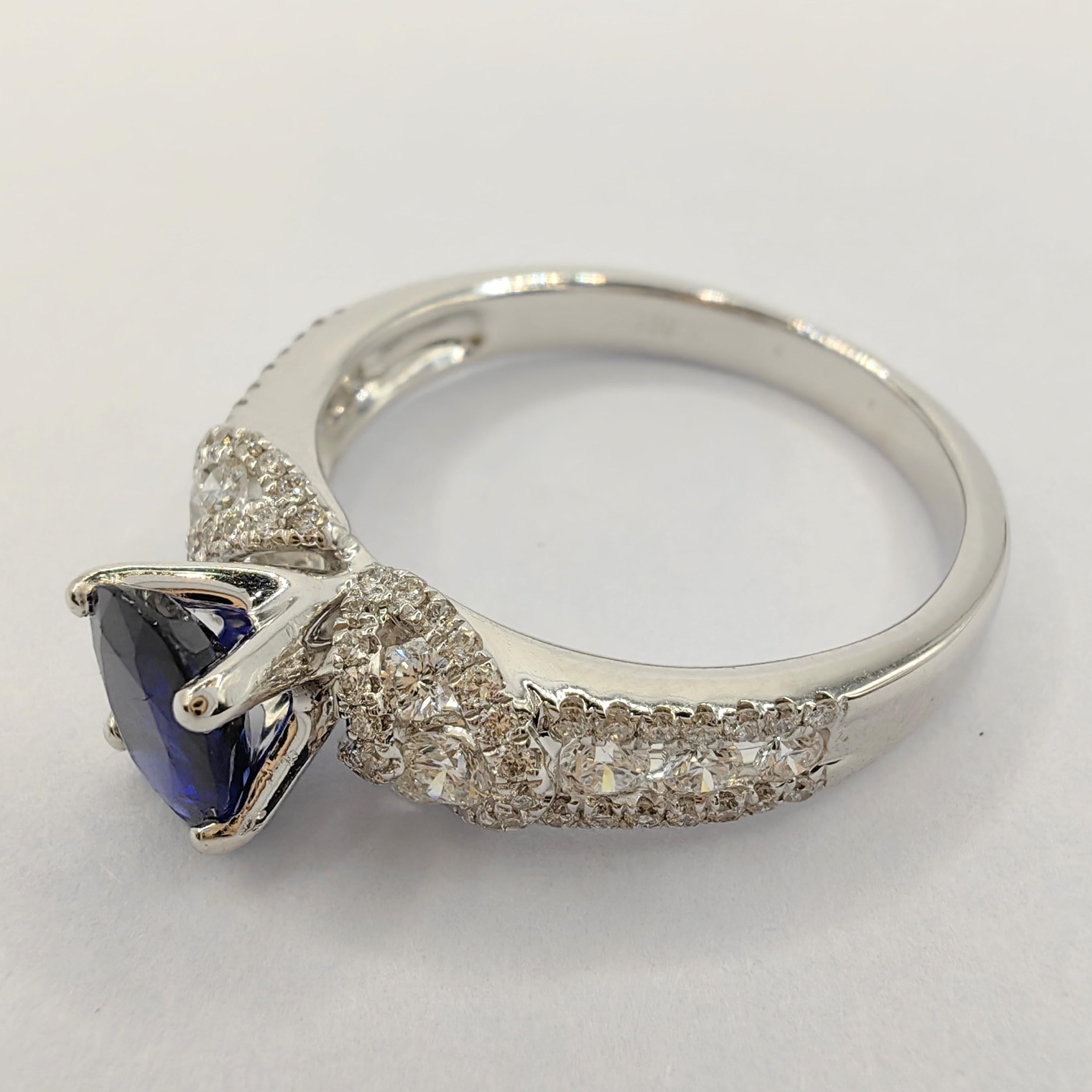 Contemporary .88 Carat Oval-Cut Sapphire 88 Diamond Cluster Ring in 18k White Gold For Sale