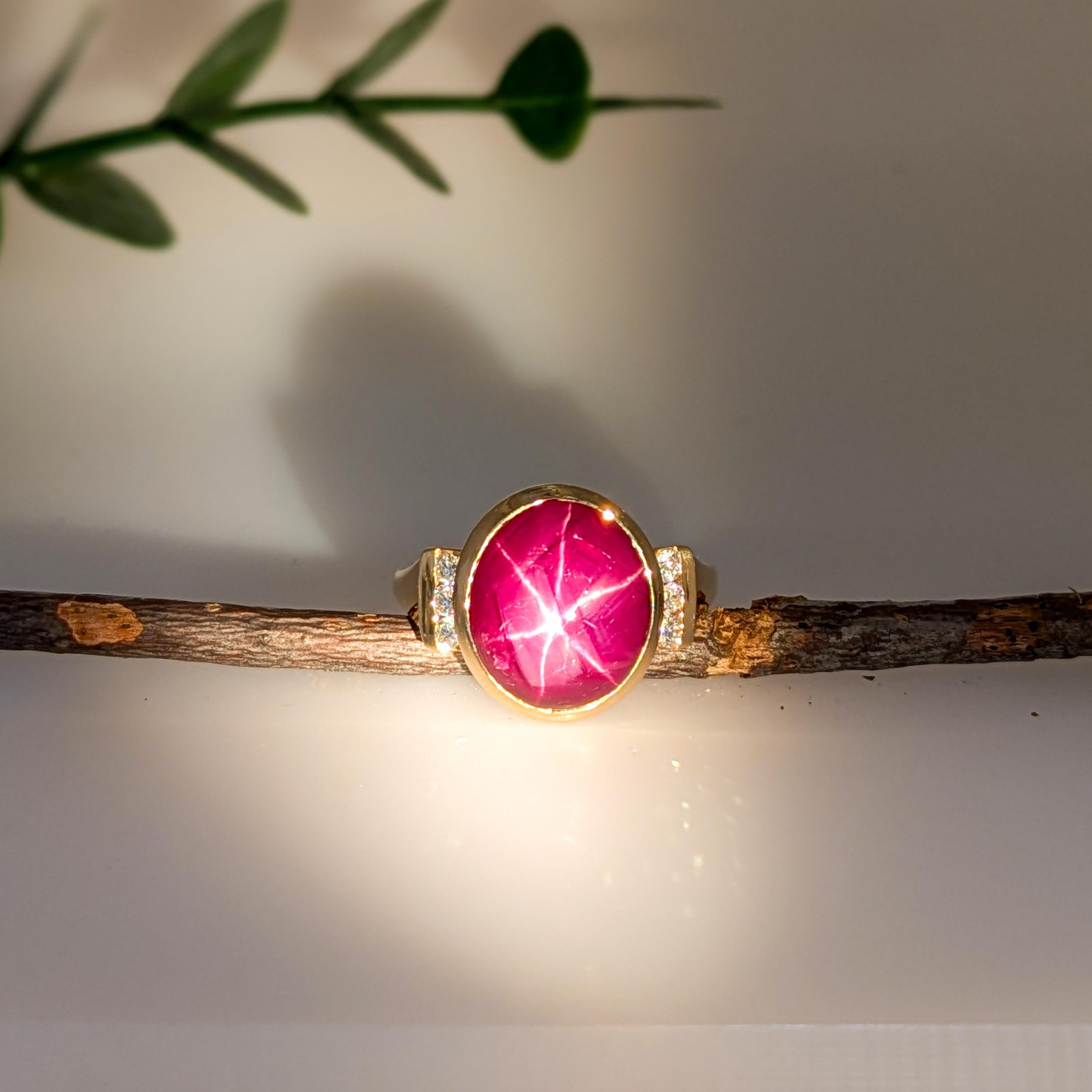 This stunning 8.8-carat Star Ruby ring shines with a natural star-like glow. Set in solid 14K gold, it is accented with sparkling earth-mined diamonds, adding extra elegance. A unique and timeless piece for any jewelry lover. This Star Ruby ring