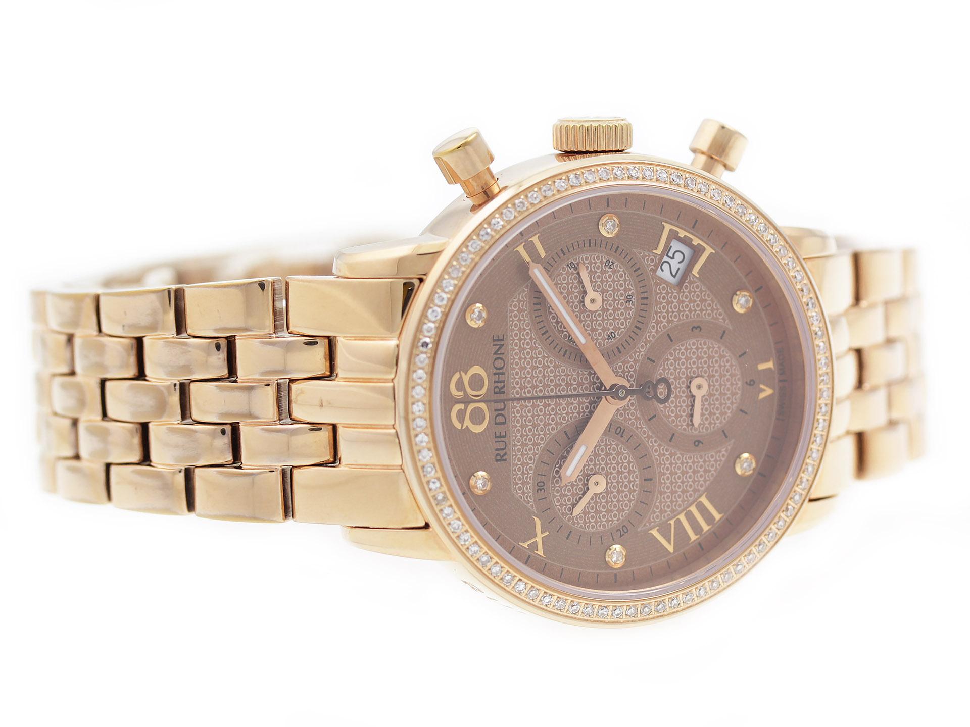 Rose gold tone steel 88 Rue Du Rhone Double 8 Origin 87WA130002 watch, water resistant to 50m, with date, chronograph, and bracelet.

Watch	
Brand:	88 Rue Du Rhone
Series:	Double 8
Model #:	87WA130002
Gender:	Ladies’
Condition:	Pristine Condition