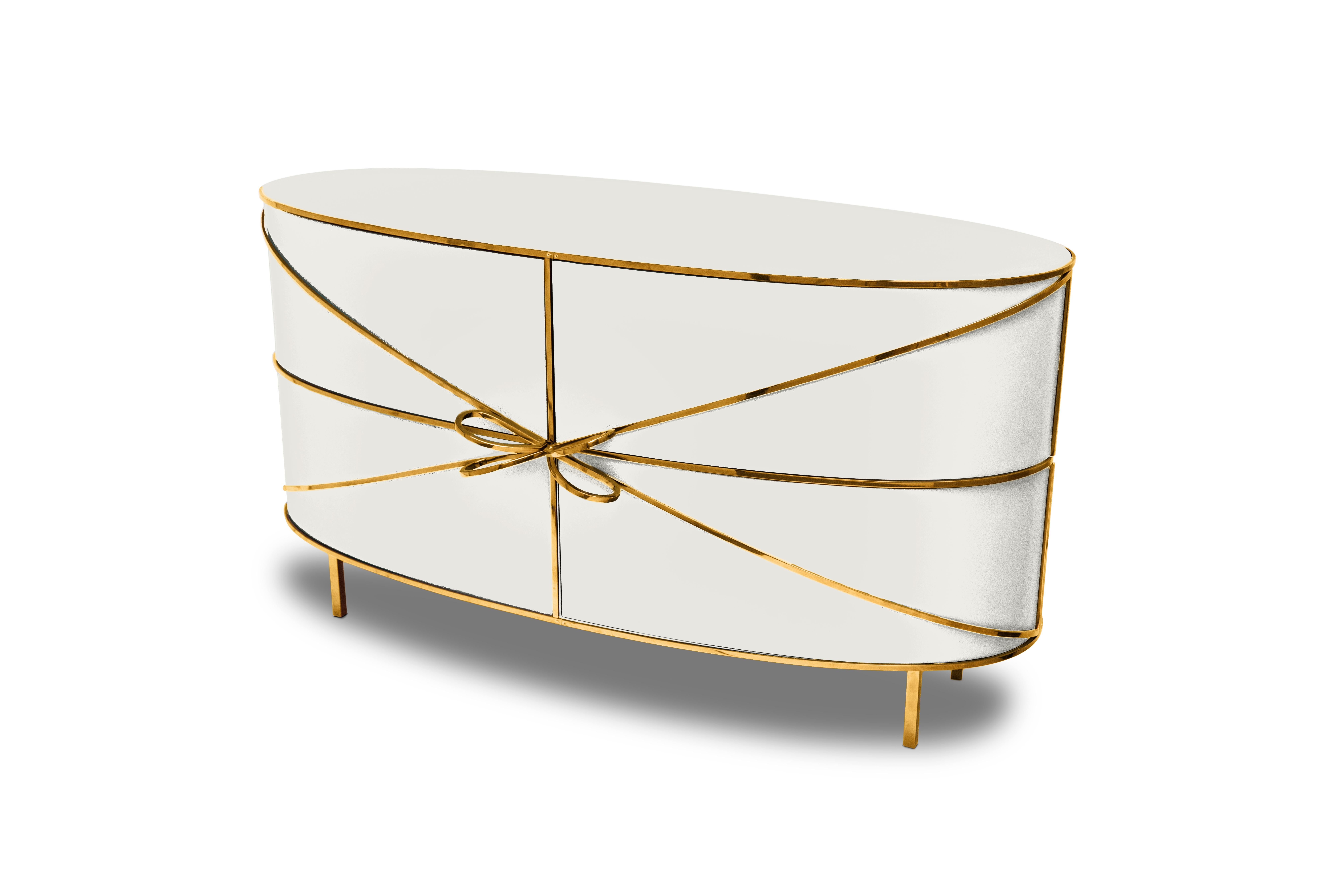 88 Secrets Sideboard blanc avec garnitures dorées Nika Zupanc est un meuble blanc immaculé aux lignes sensuelles et féminines avec de luxueuses garnitures en métal doré. Une pièce maîtresse dans tout espace intérieur !

Nika Zupanc, designer slovène