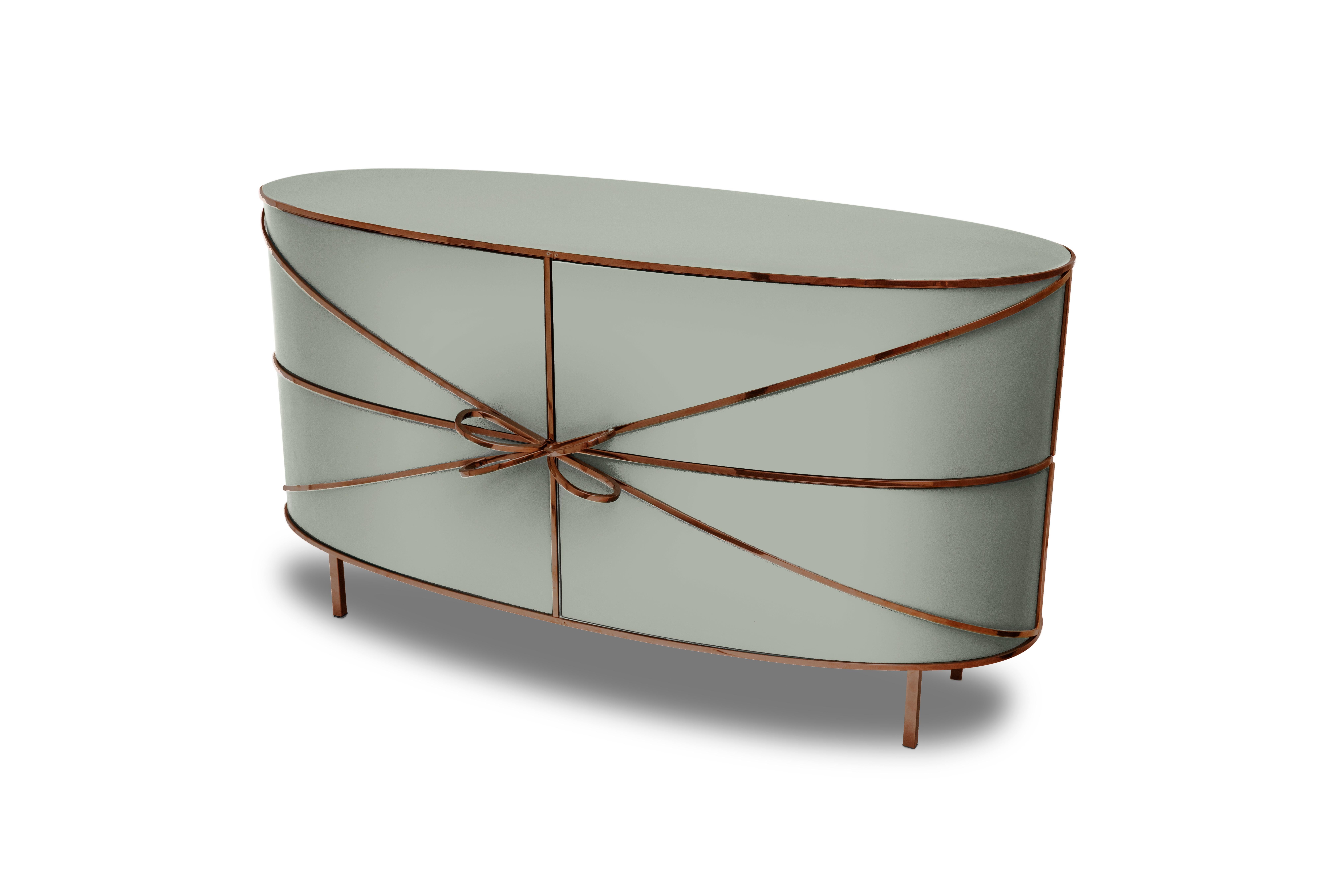 88 Secrets Gray Sideboard with Rose Gold Trims by Nika Zupanc is a chic gray cabinet in sensuous, feminine lines with luxurious rose metal trims. A statement piece in any interior space!

Nika Zupanc, a strikingly renowned Slovenian designer, never