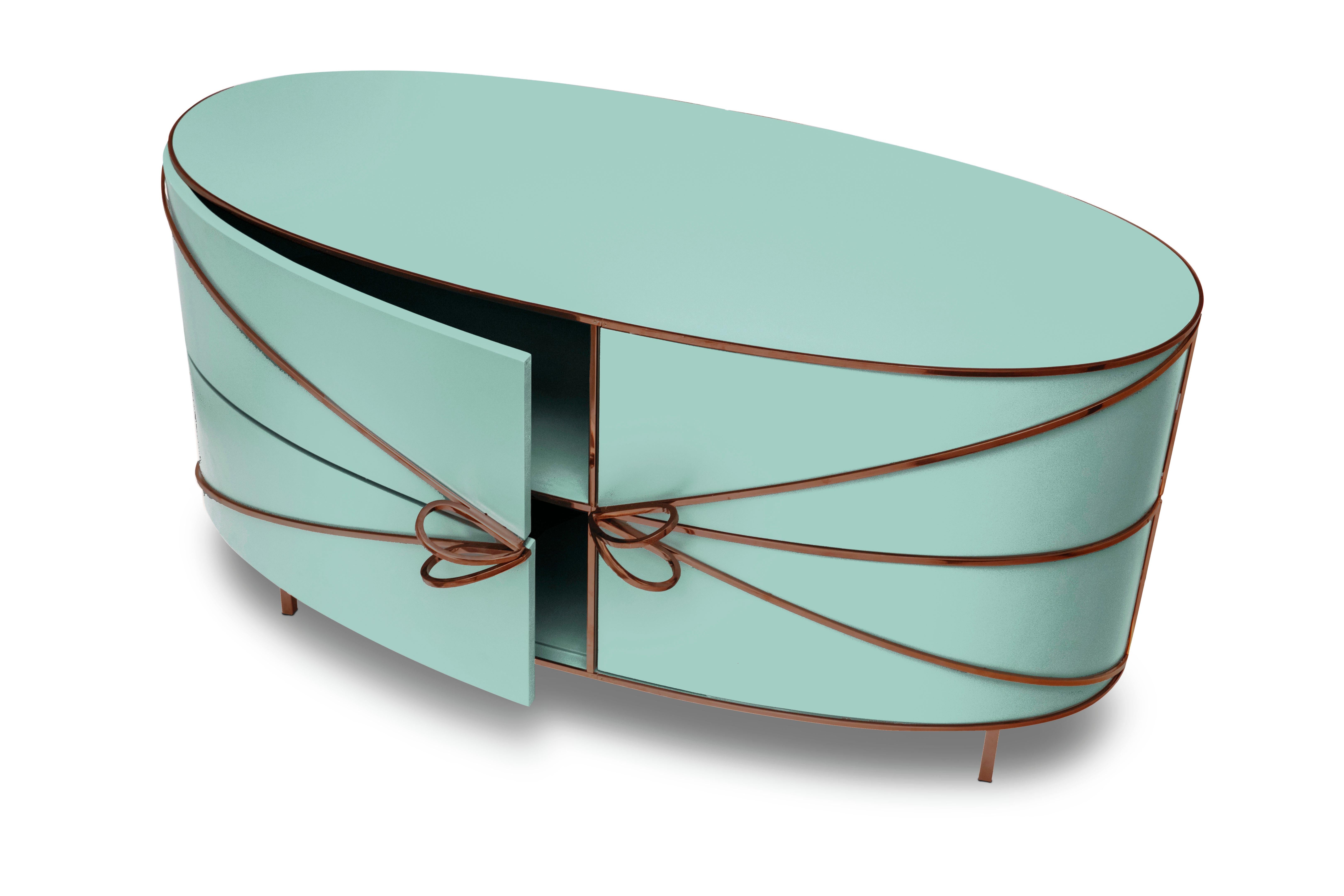 88 Secrets Mint Green Sideboard with Rose Gold Trims by Nika Zupanc is a mint green cabinet in sensuous, feminine lines with luxurious metal trims in rose gold. A statement piece in any interior space!

Nika Zupanc, a strikingly renowned Slovenian