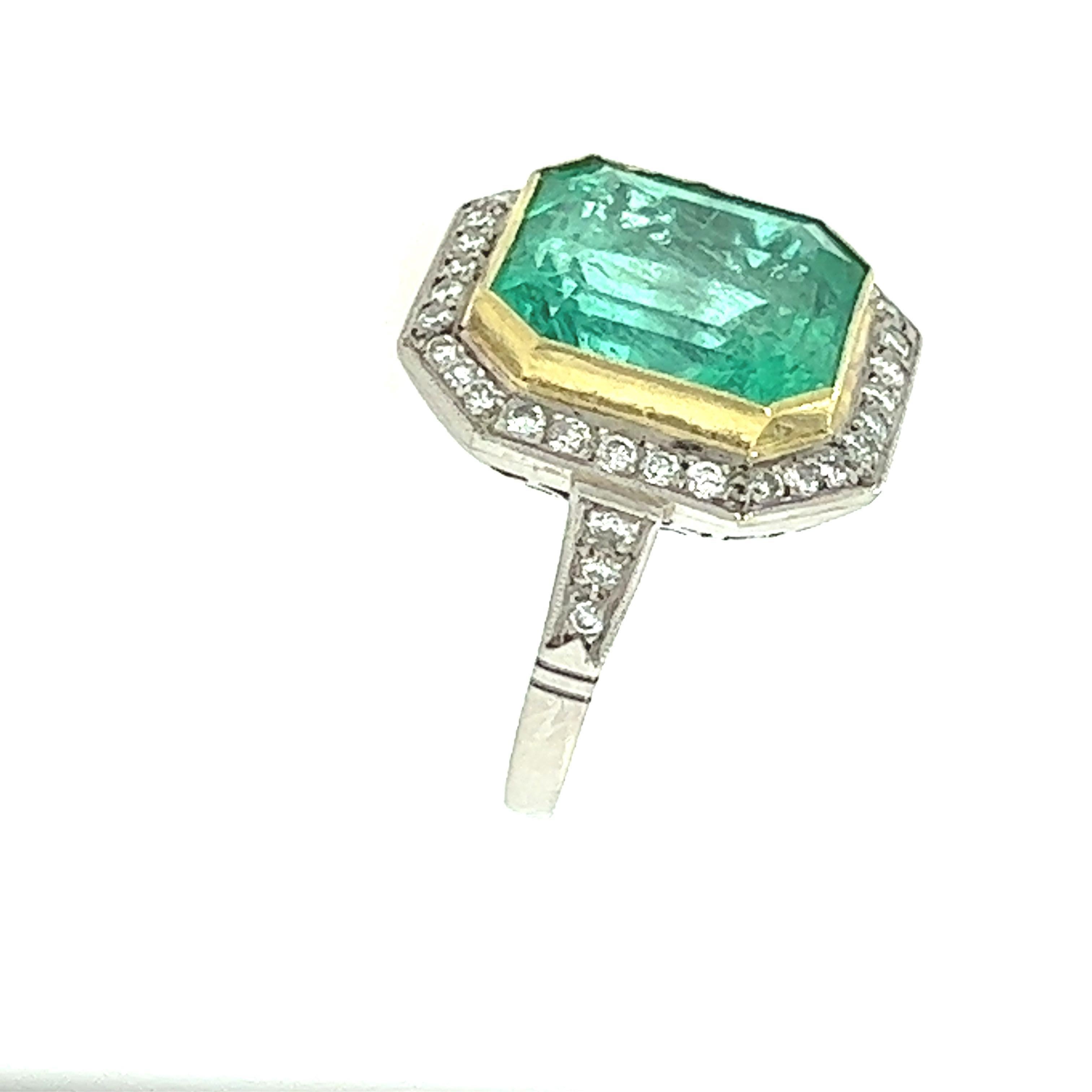 Art Deco 8.80 Carat Emerald and Diamond Ring