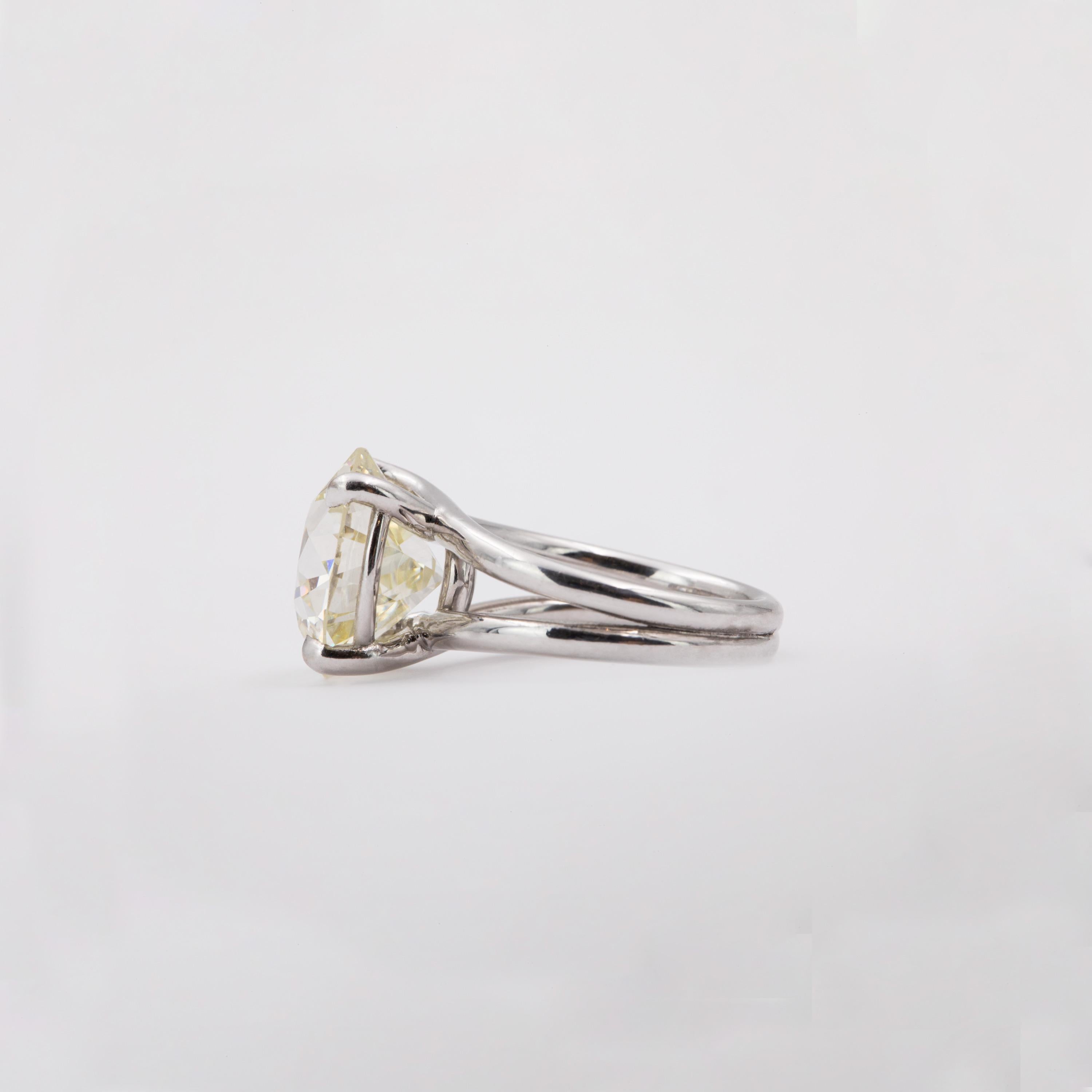 Old European cuts offer an enticing charm and make one nostalgic. This stone is a true old-cut, meaning that it was actually made in the 20th century, compared to diamonds that are cut today to look like old ones. The newly made twin shank is