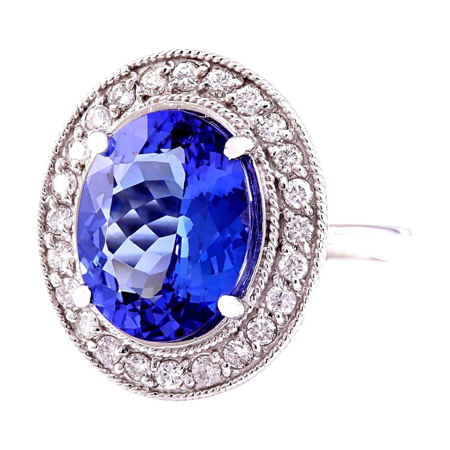 8.80 Carat  Tanzanite 14K Solid White Gold Diamond Ring
Item Type: Ring
Item Style: Cocktail
Material: 14K White Gold
Mainstone: Tanzanite
Stone Color: Blue
Stone Weight: 8.00 Carat
Stone Shape: Oval
Stone Quantity: 1
Stone Dimensions: 14.00x10.00