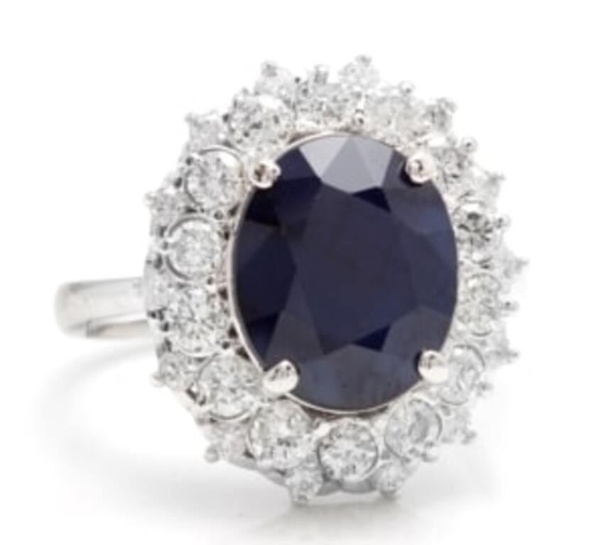 8.80 Carats Exquisite Natural Blue Sapphire and Diamond 14K Solid White Gold Ring

Total Blue Sapphire Weight is: 7.50 Carats (Treated)

Sapphire Measures: 12 x 10mm

Natural Round Diamonds Weight: 1.30 Carats (color G-H / Clarity SI1-SI2)

Ring