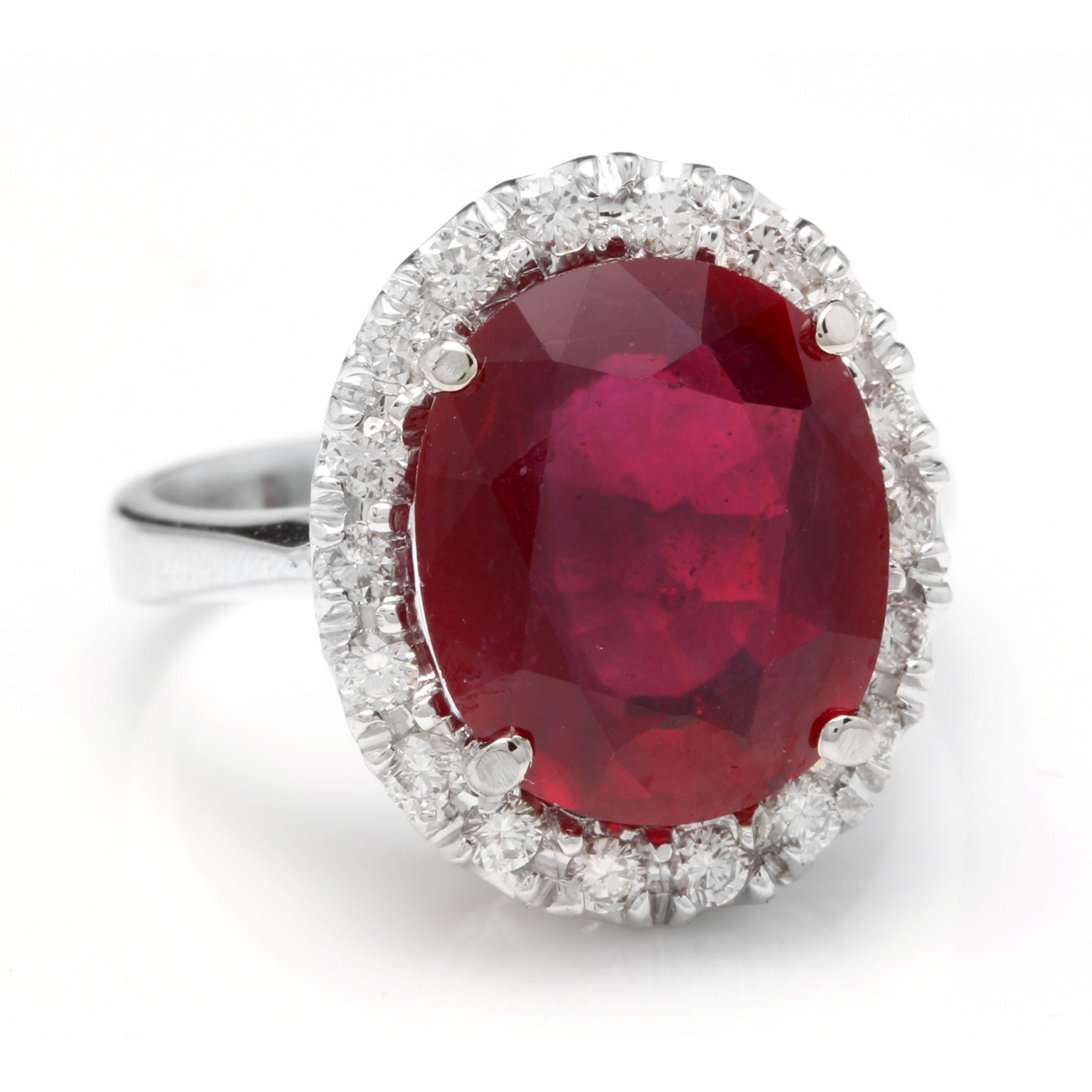 8.80 Carats Impressive Natural Red Ruby and Diamond 14K White Gold Ring

Total Red Ruby Weight is: Apprx. 8.00 Carats (Lead Glass Filled)

Ruby Measures: Approx. 12.00 x 10.00mm

Natural Round Diamonds Weight: Approx. 0.80 Carats (color G-H /