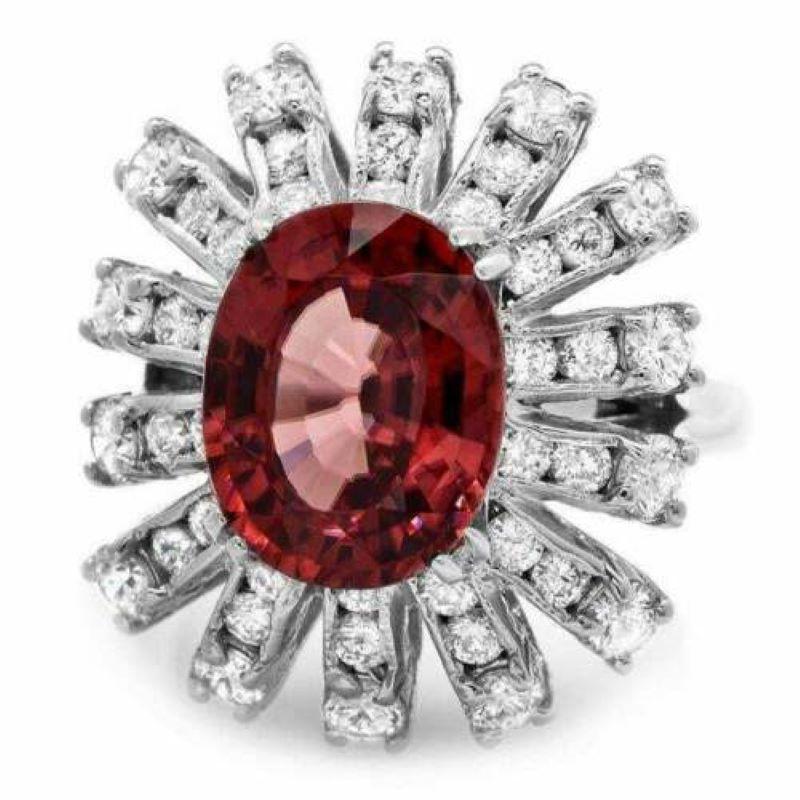 8.80 Carats Natural Very Nice Looking Red Zircon and Diamond 14K Solid White Gold Ring

Suggested Replacement Value: Approx. $8,500.00

Total Natural Oval Cut Zircon Weight is: Approx. 7.00 Carats 

Zircon Measures: Approx. 11.00 x 9.00mm

Natural
