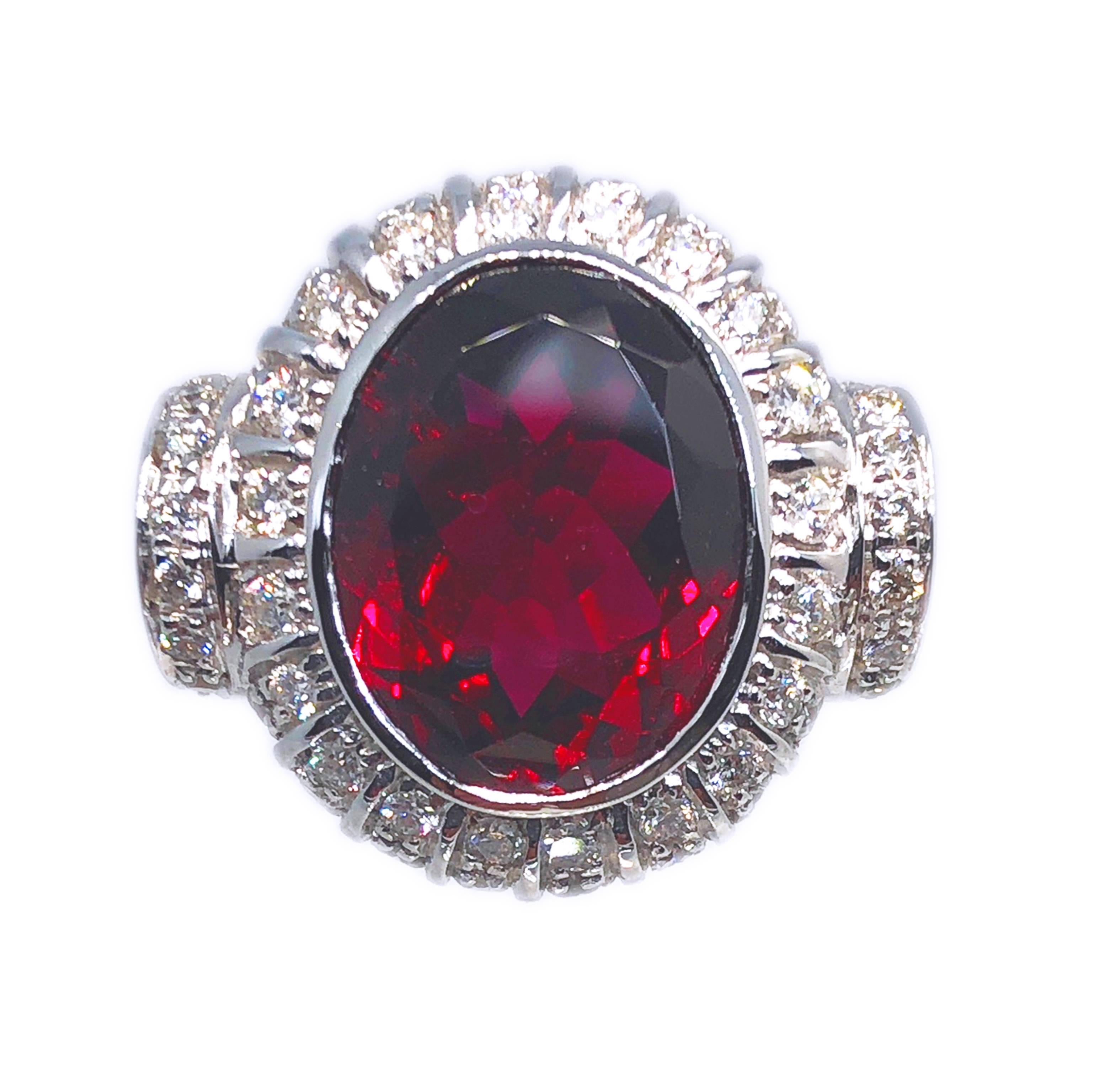 One-of-a-kind, Beautiful 8.81 Kt Natural Oval Cut Red Tourmaline(Rubelite) in a Sumptuos White Diamond, 18 Kt White Gold Setting(1.53 kt, F-G, VVs1).
Us size 6 1/2
French size 54

We offer complimentary resizing on this piece