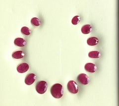 88.13 Carats Ruby Mozambique Oval Faceted Cut stone Layout Heated Natural Gem