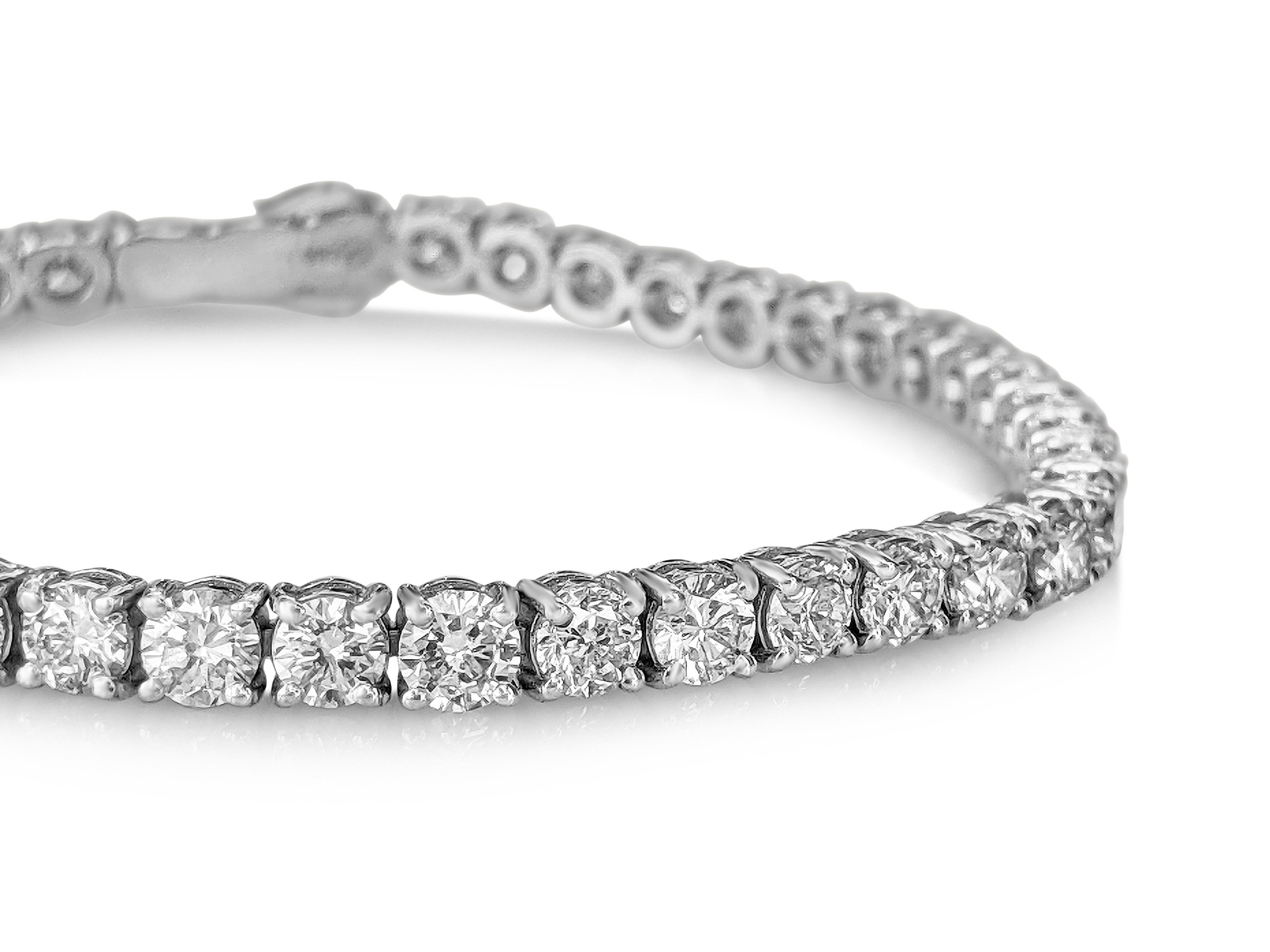 Magnificent diamond tennis bracelet of top quality, 8.82 Carat F-I and VVS1-VVS2 clarity. 
A truly one of a kind masterpiece!

Side Stones:
___________
Natural Diamonds
Cut: Round Brilliant
Carat: 8.82 tcw / 45 stones
Color: F-I
Clarity:VVS1-VVS2
