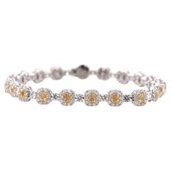 8.83 Carat Fancy Yellow Diamonds and White Diamonds Tennis Bracelet 18K Gold