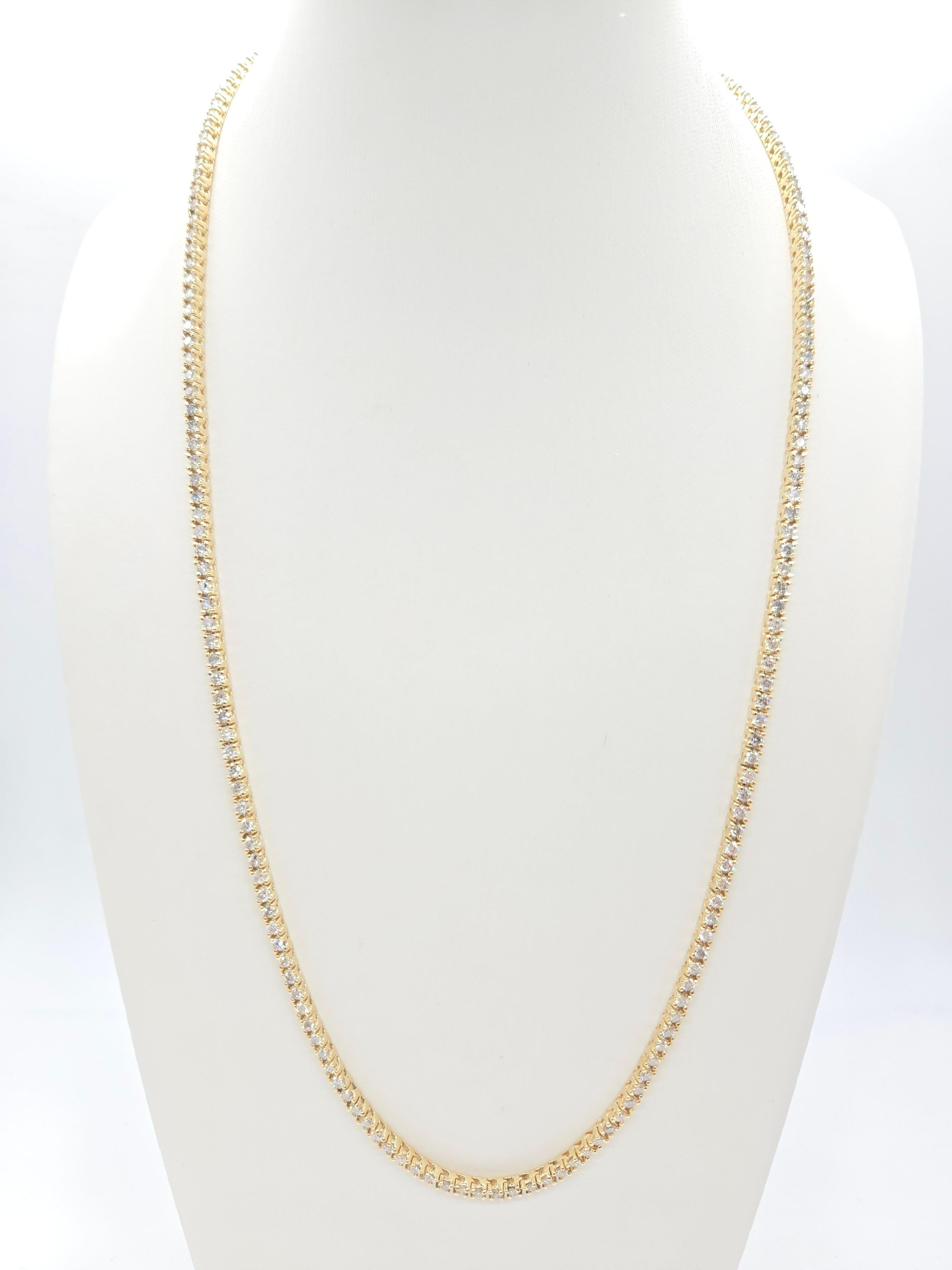 Elegant Tennis Necklace with Natural Round-Brilliant Cut Diamonds

This brilliant and beautiful tennis necklace features natural round-brilliant cut white diamonds, known for their clean appearance and exceptional sparkle. Set in 14k yellow gold,