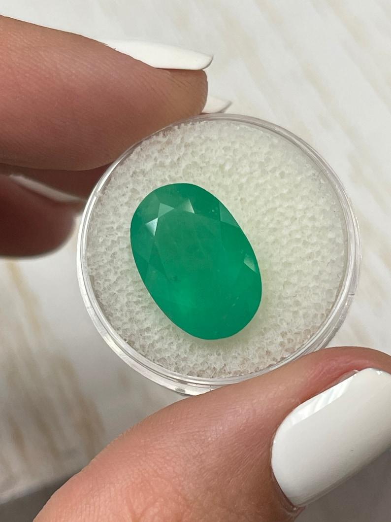 Modern 8.85 Carat Grassy Green Colombian Emerald Oval Cut - May Birthstone Gem For Sale