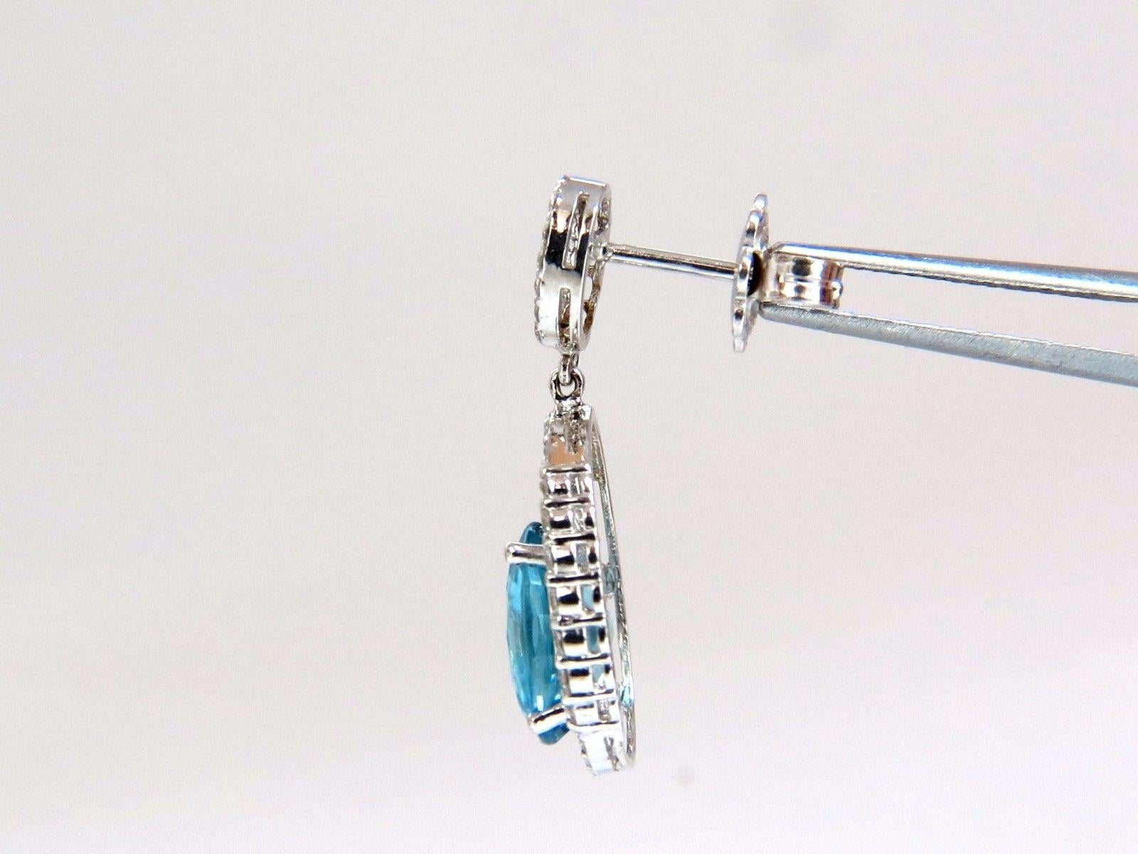Taglio ovale 8,86 carati di zircone naturale blu indaco Vivid Diamonds Orecchini pendenti 14 carati in vendita