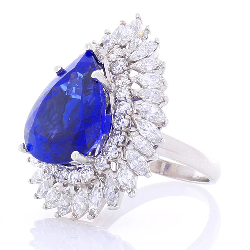 This is the definition of a sensational cocktail ring. An 8.87 carat pear shaped tanzanite is the center.  The gem source is near the foothills of Mt. Kilimanjaro in Tanzania. The color is intense bluish violet; its color is evenly distributed