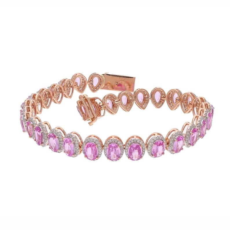 A stunning bracelet handmade in 18K gold. It is set in 8.87 carats oval pear cut pink sapphire and 1.48 carats of sparkling diamonds.

FOLLOW MEGHNA JEWELS storefront to view the latest collection & exclusive pieces.  Meghna Jewels is proudly rated