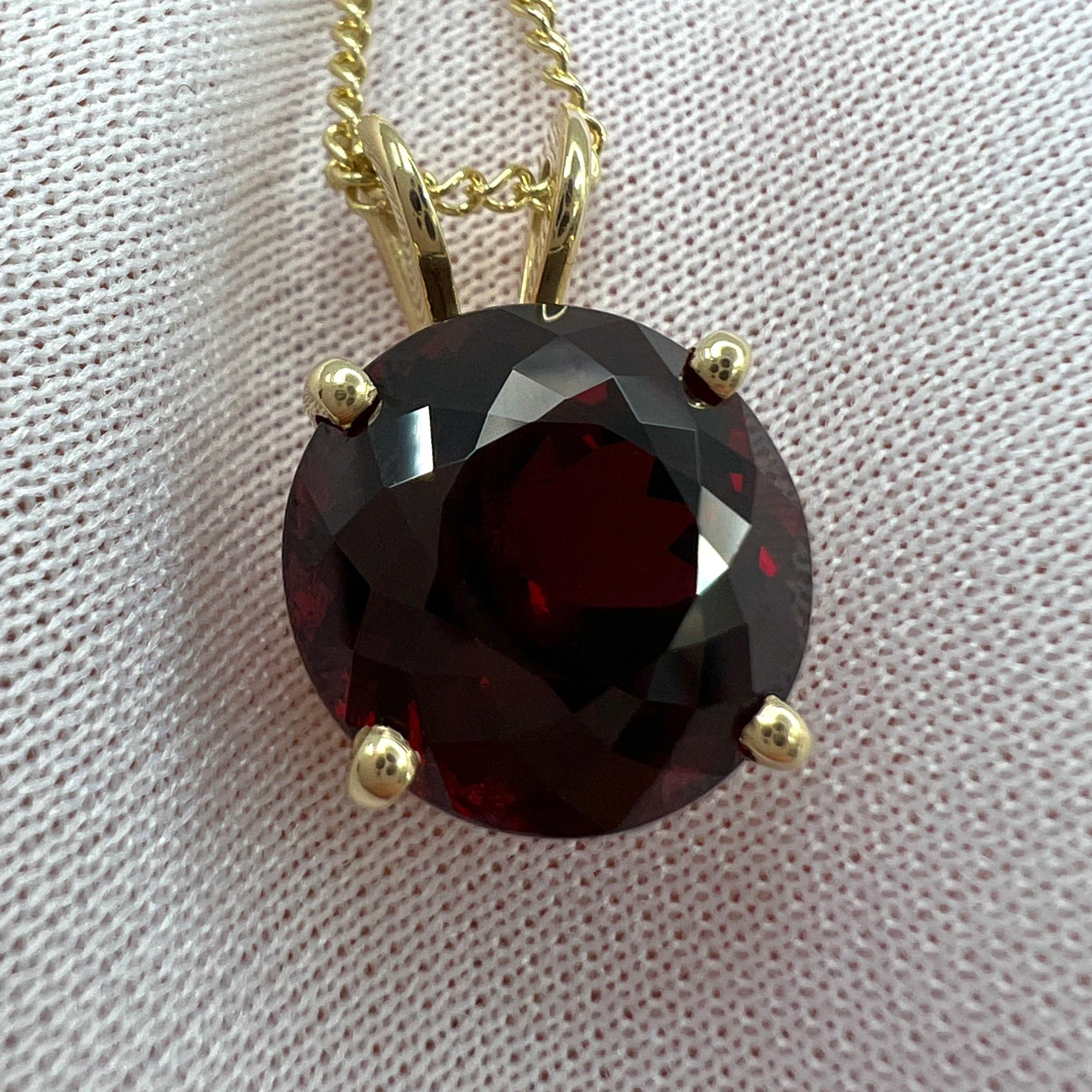 Natural Vivid Red Rhodolite Garnet Round Cut Yellow Gold Pendant Necklace.

Large 8.88 carat fine red garnet set in a beautiful 9k yellow gold solitaire pendant with a split bail.

This stone has an excellent fancy round brilliant cut and excellent
