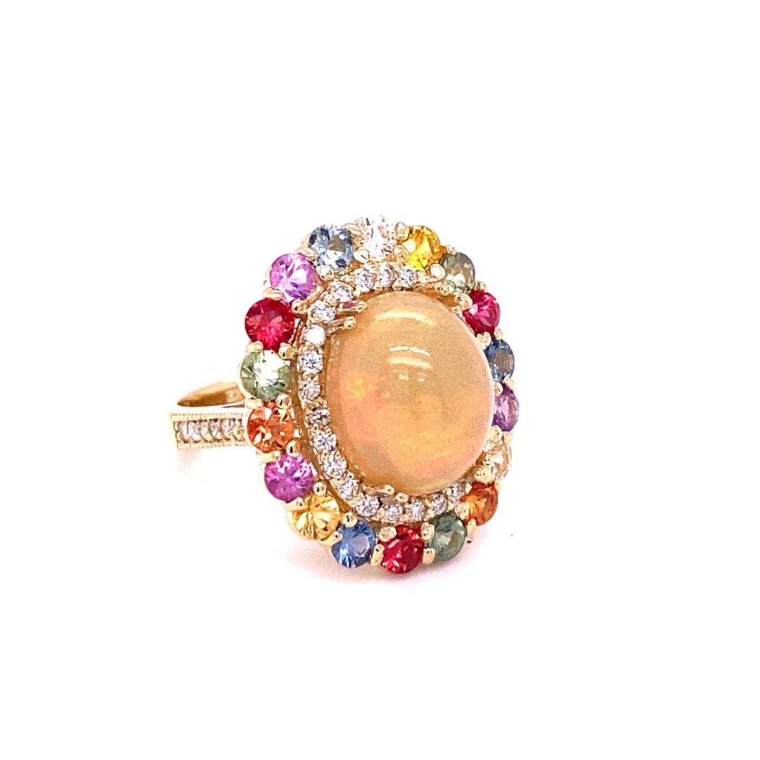 Oval Cut 8.89 Carat Natural Opal Multi Sapphire Diamond Yellow Gold Cocktail Ring For Sale