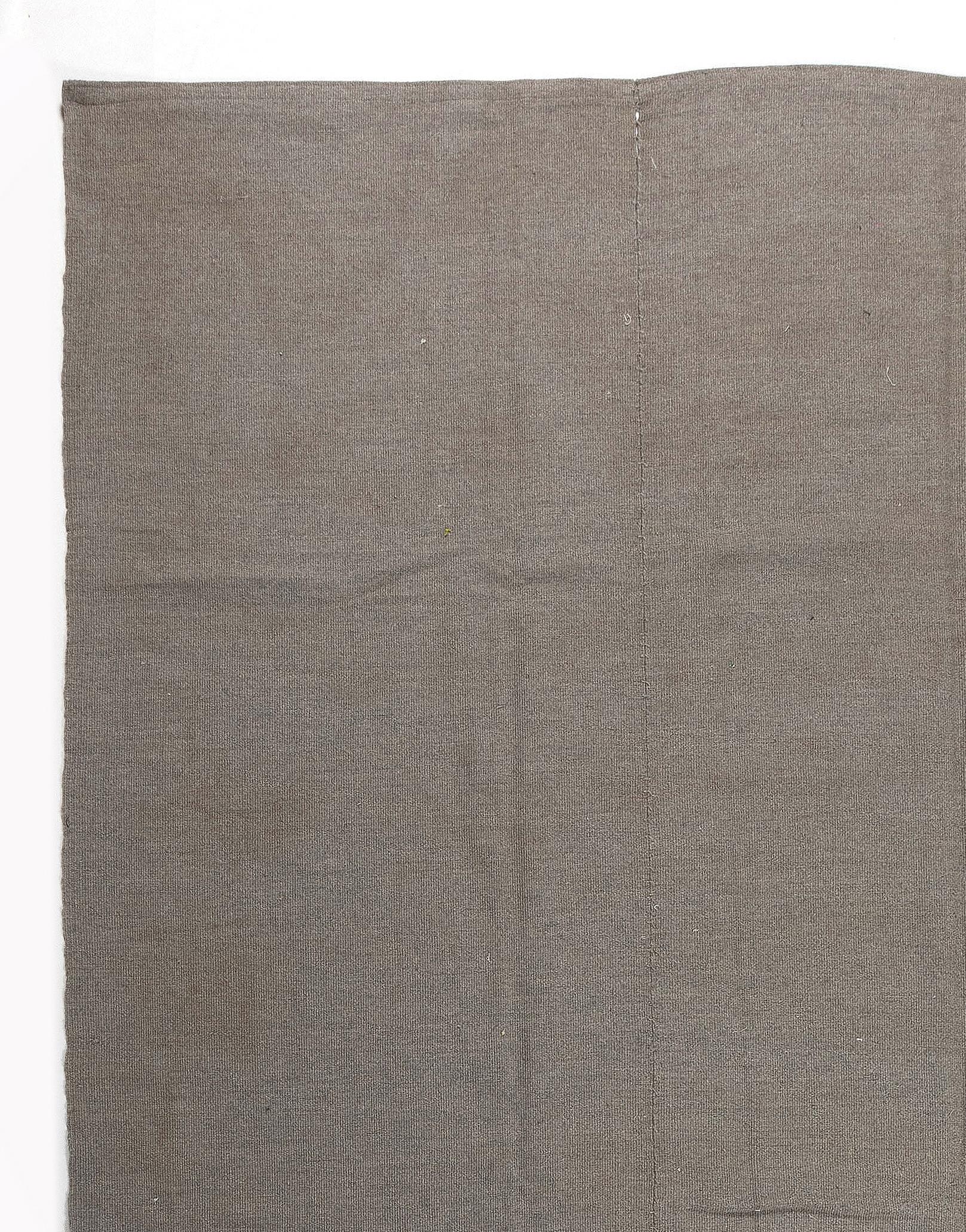 A modern flat-weave rug with minimal design. Handwoven by female artisans in a rural village workshop in Eastern Turkey under the supervision and with the support of Ministry of Education and Ministry of Culture and Tourism of Turkey.
Wool wefts on