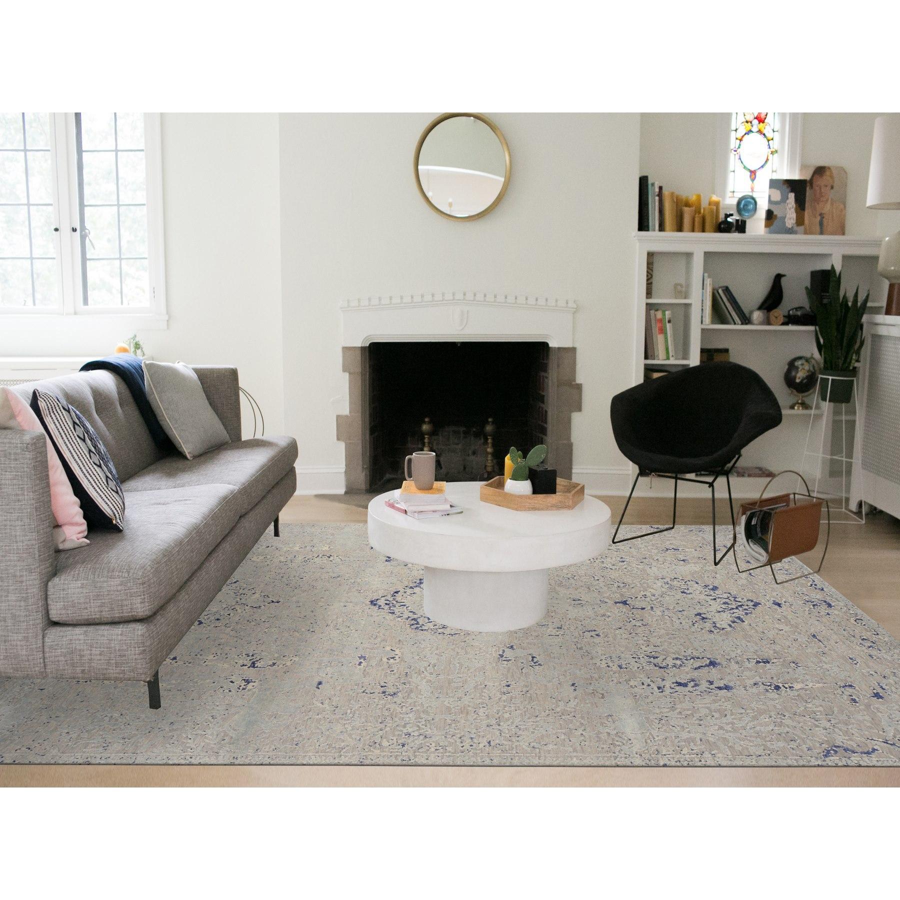 Alice Blue, Broken and Erased Medallion Design, Silk with Textured Wool, Hand Knotted, Oriental Rug
Primary materials: Wool & Silk
Latex: No Pile 
height: 0.25 Inches
Style: Transitional
Primary color: Blue
Secondary colors: Cream Color,