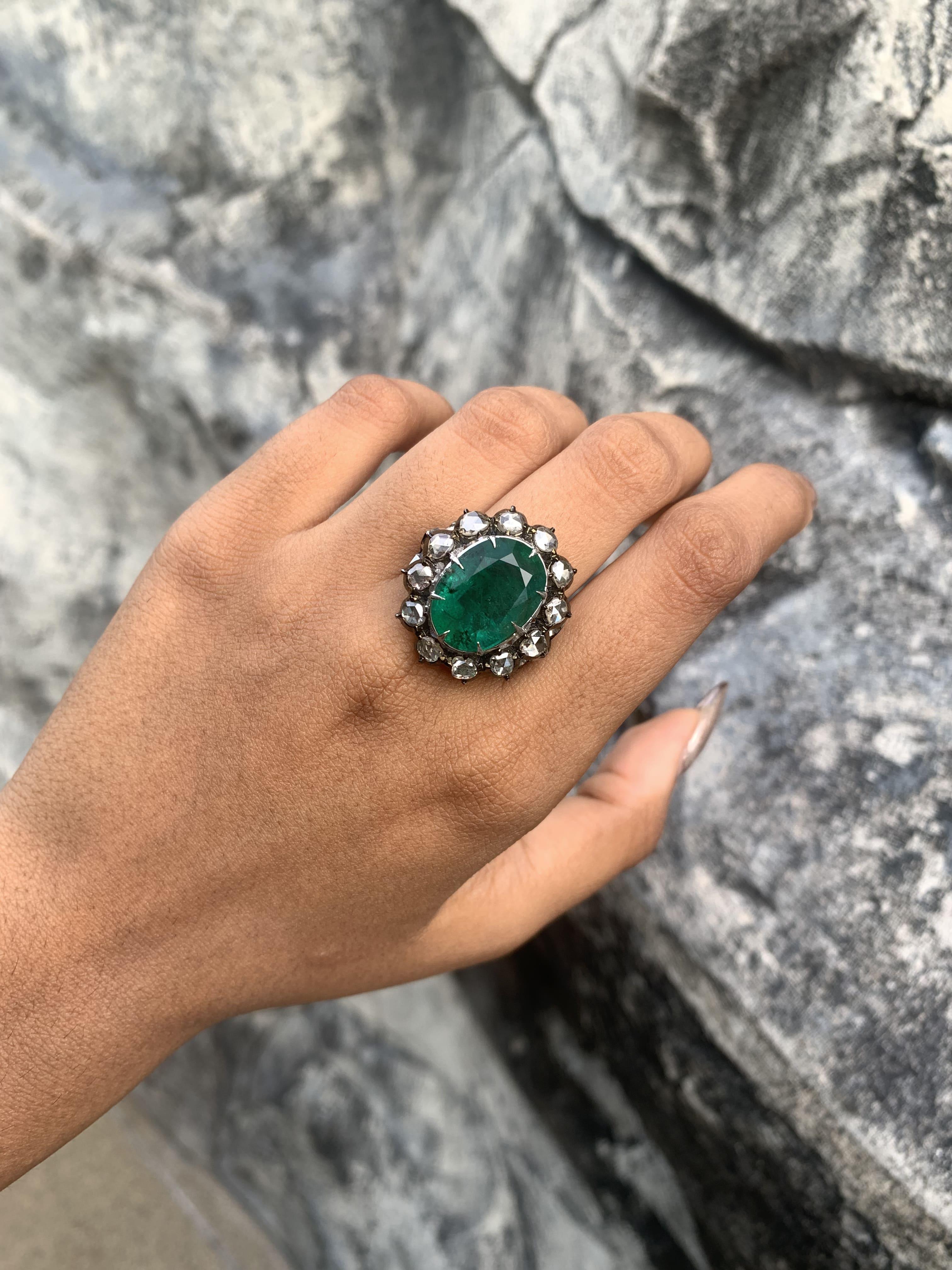 Indulge in the enchanting allure of this Art Deco-inspired masterpiece, specially handcrafted to showcase the unparalleled beauty of this 8.90 carat Zambian emerald. Hailing from the lush mines of Zambia, this emerald is a testament to nature's