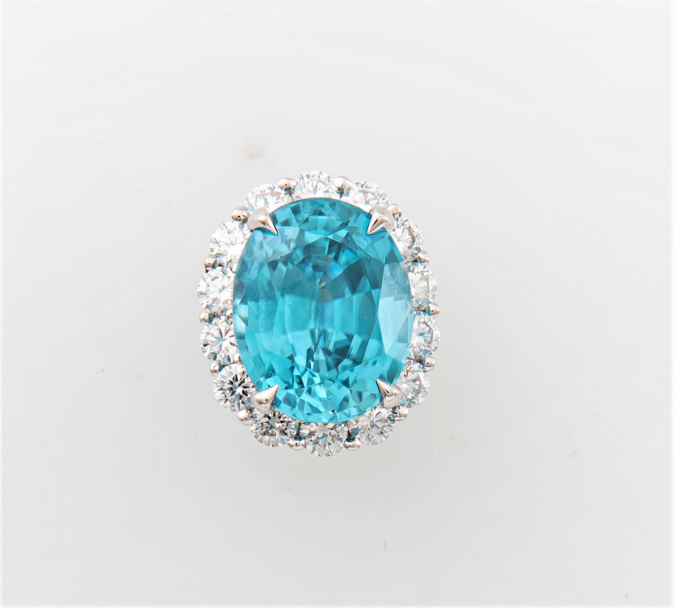 Oval Cut 8.90 Carat Blue Oval Zircon Stud Earrings with 1.30 Carat Round Diamond Halos For Sale