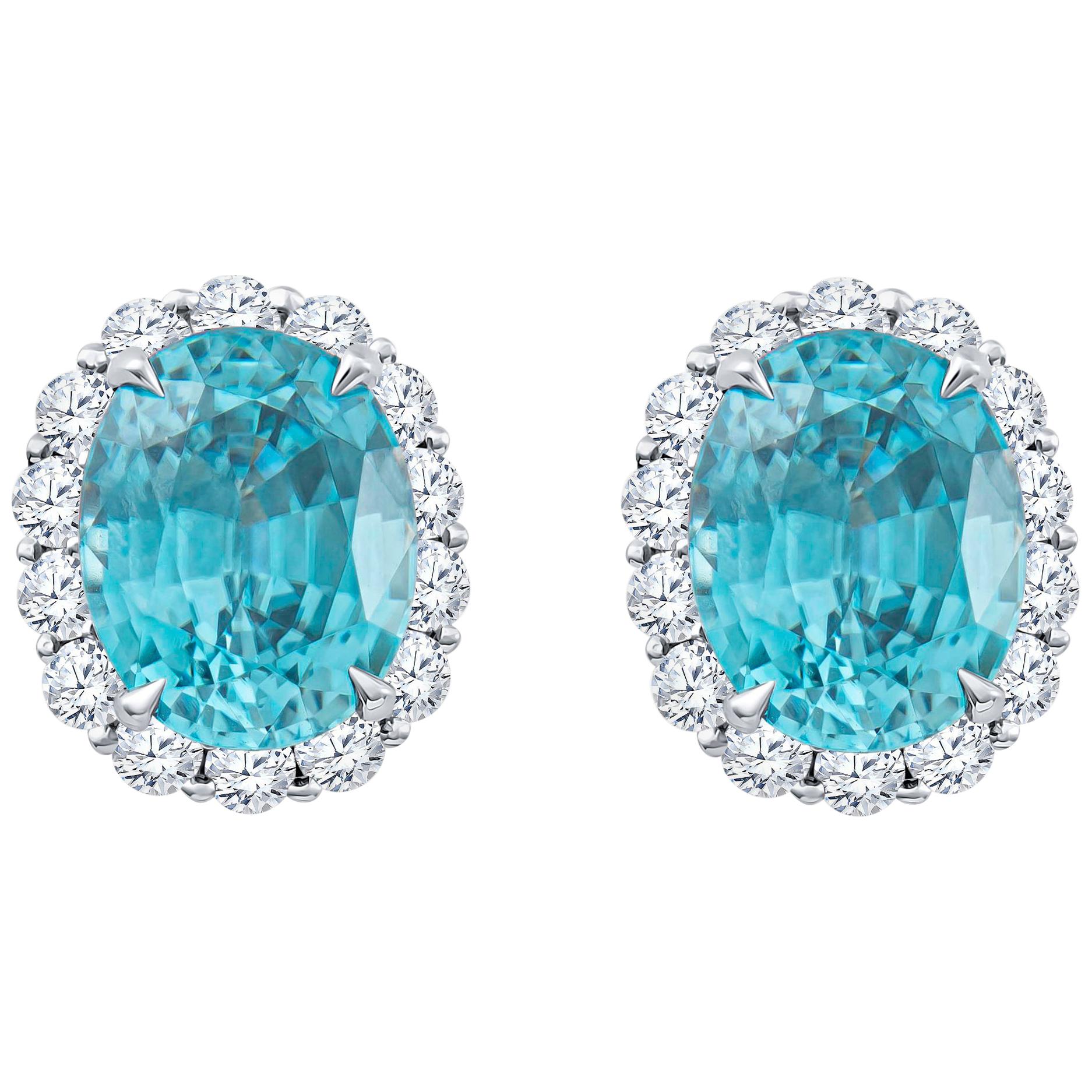 8.90 Carat Blue Oval Zircon Stud Earrings with 1.30 Carat Round Diamond Halos