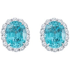 8.90 Carat Blue Oval Zircon Stud Earrings with 1.30 Carat Round Diamond Halos