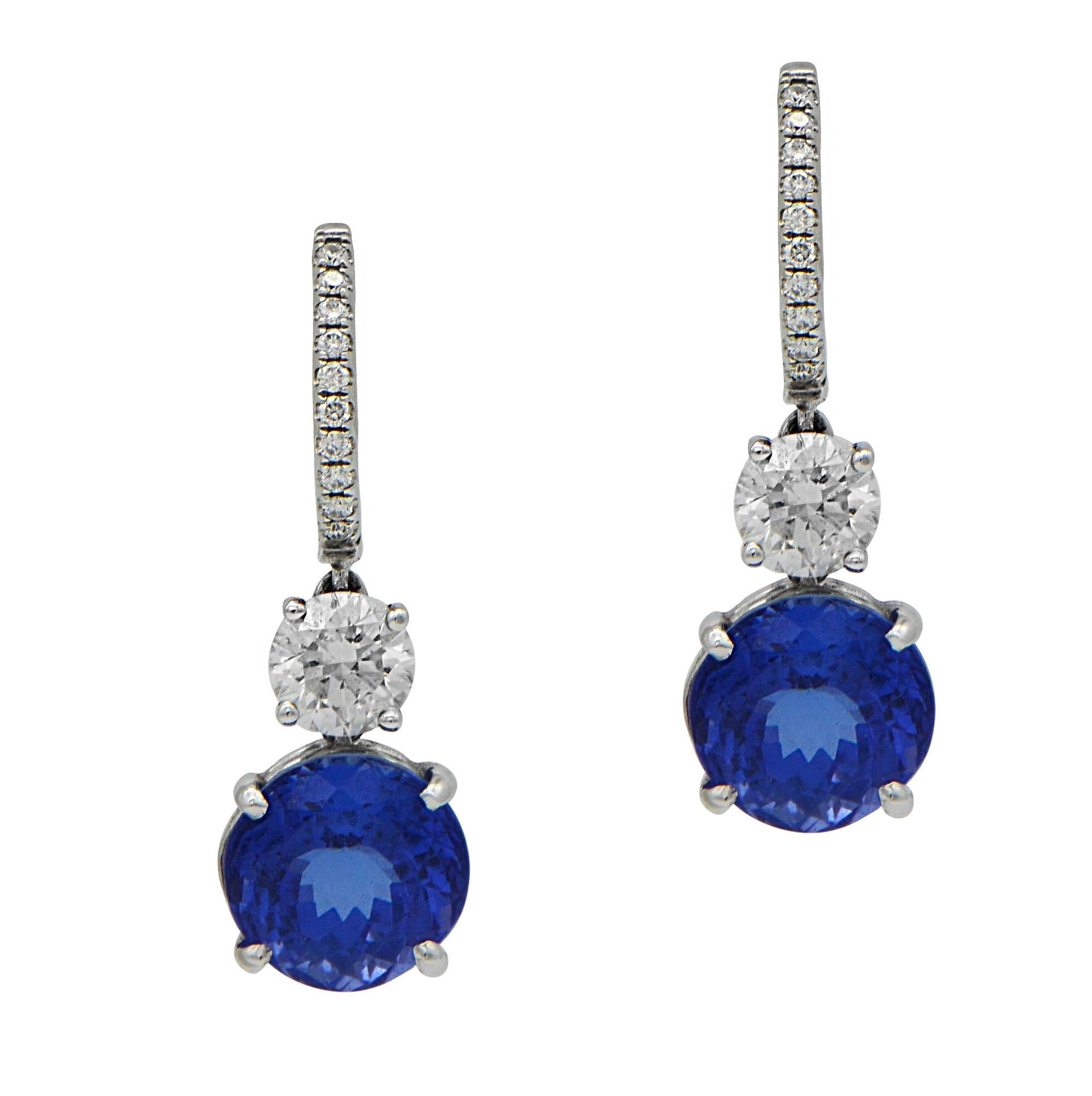 8.90 Total Carat Tanzanite and Diamond Drop Earrings in 18K White Gold

Tanzanite is a unique stone with a very special sparkle, and these handcrafted earrings display that sparkle perfectly! Handmade by our expert jewelers from the finest