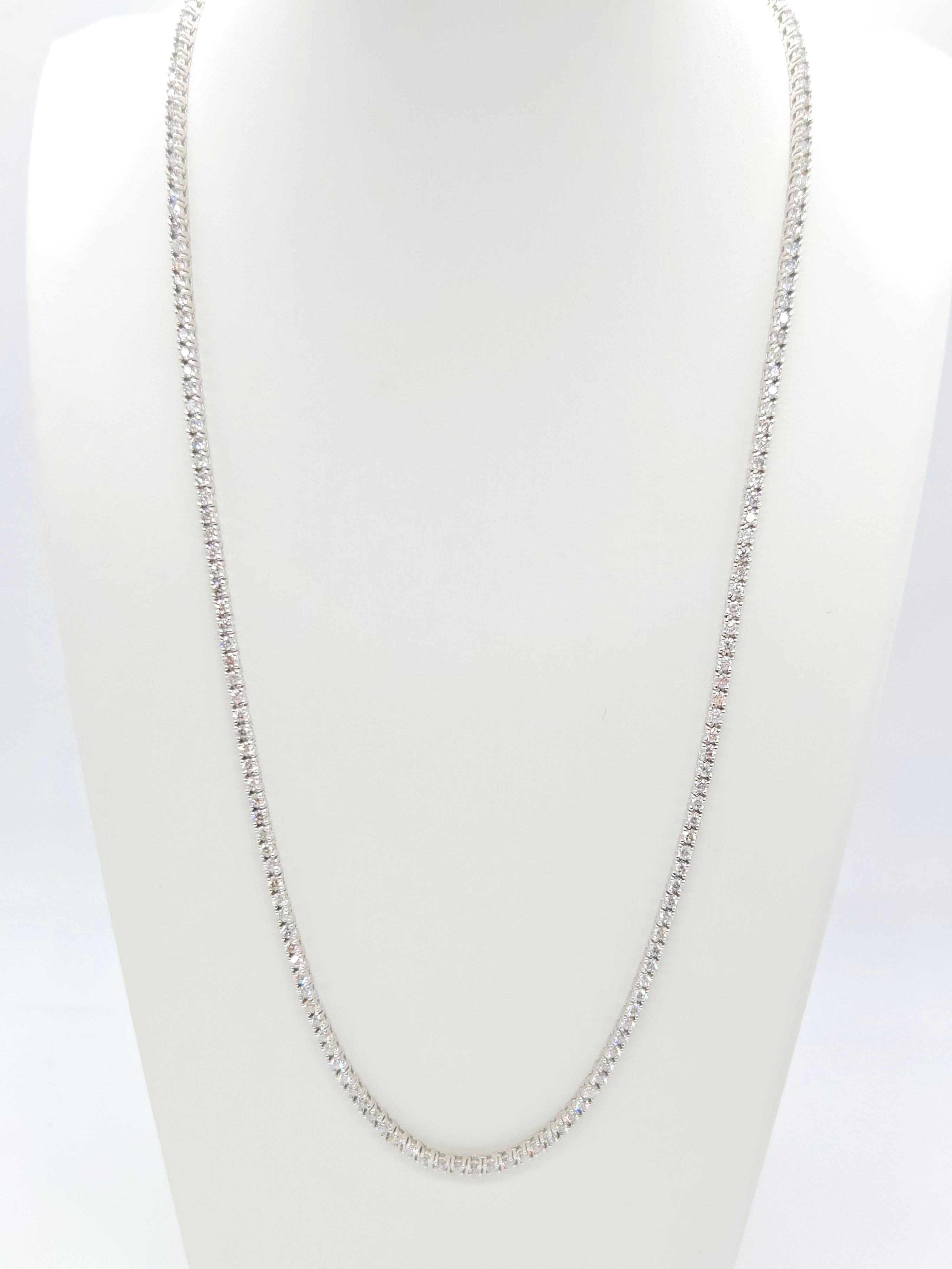 Atemberaubende 8,91 Karat Tennis-Halskette aus massivem 14k Weißgold

Diese exquisite Tenniskette präsentiert weiße Diamanten im runden Brillantschliff, die aufgrund ihrer brillanten Reinheit und ihres außergewöhnlichen Funkelns ausgewählt wurden.