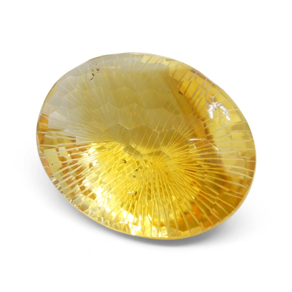 Women's or Men's 89.12ct Oval Yellow Honeycomb Starburst Citrine from Brazil For Sale
