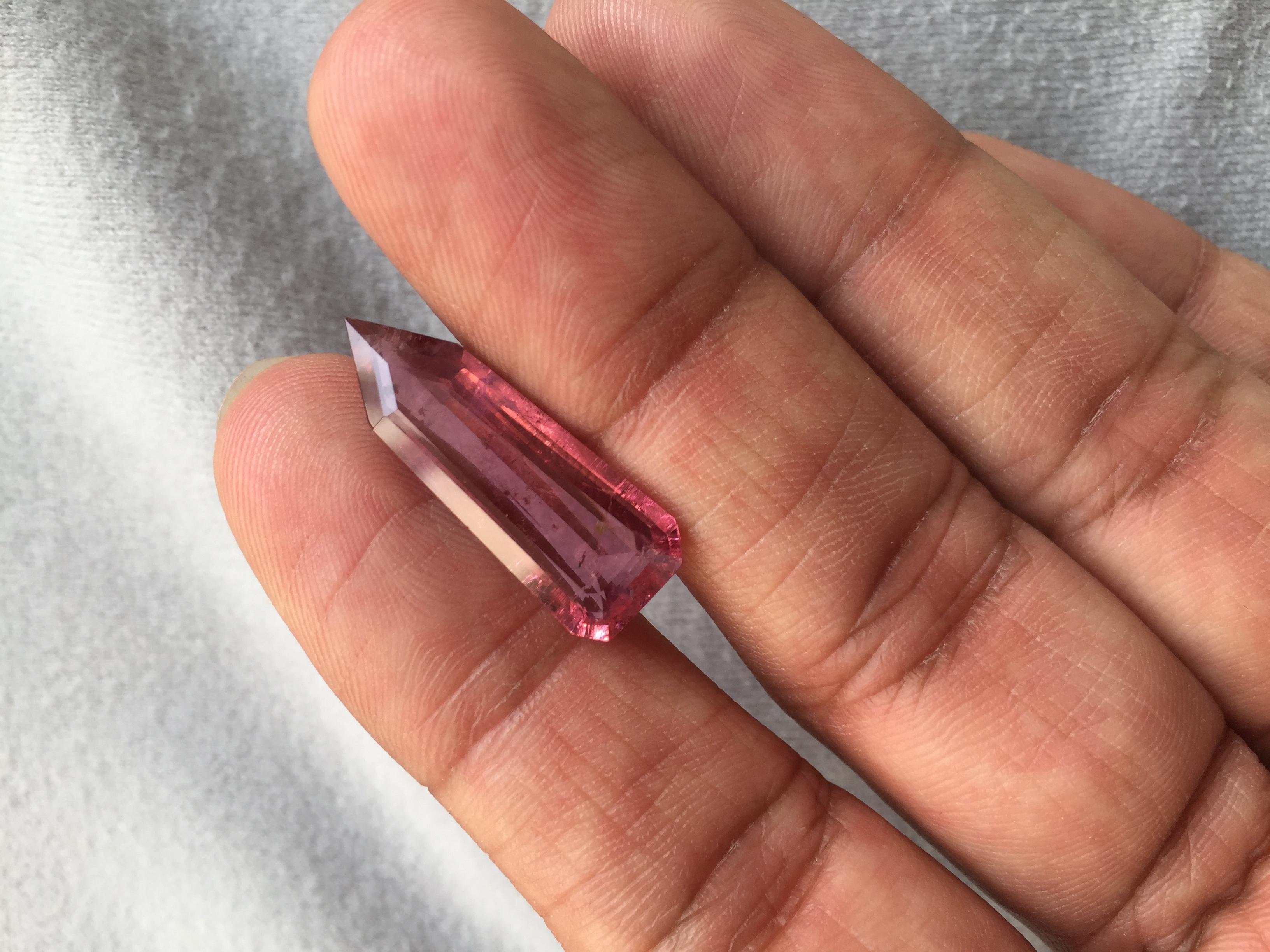 Introducing our 8.96 Carat Pink Tourmaline Fancy Cut, the perfect gemstone for high-end jewelry. Crafted from high-quality tourmaline, this stunning gemstone features a gorgeous pink that is both elegant and sophisticated. The elongated cut of the