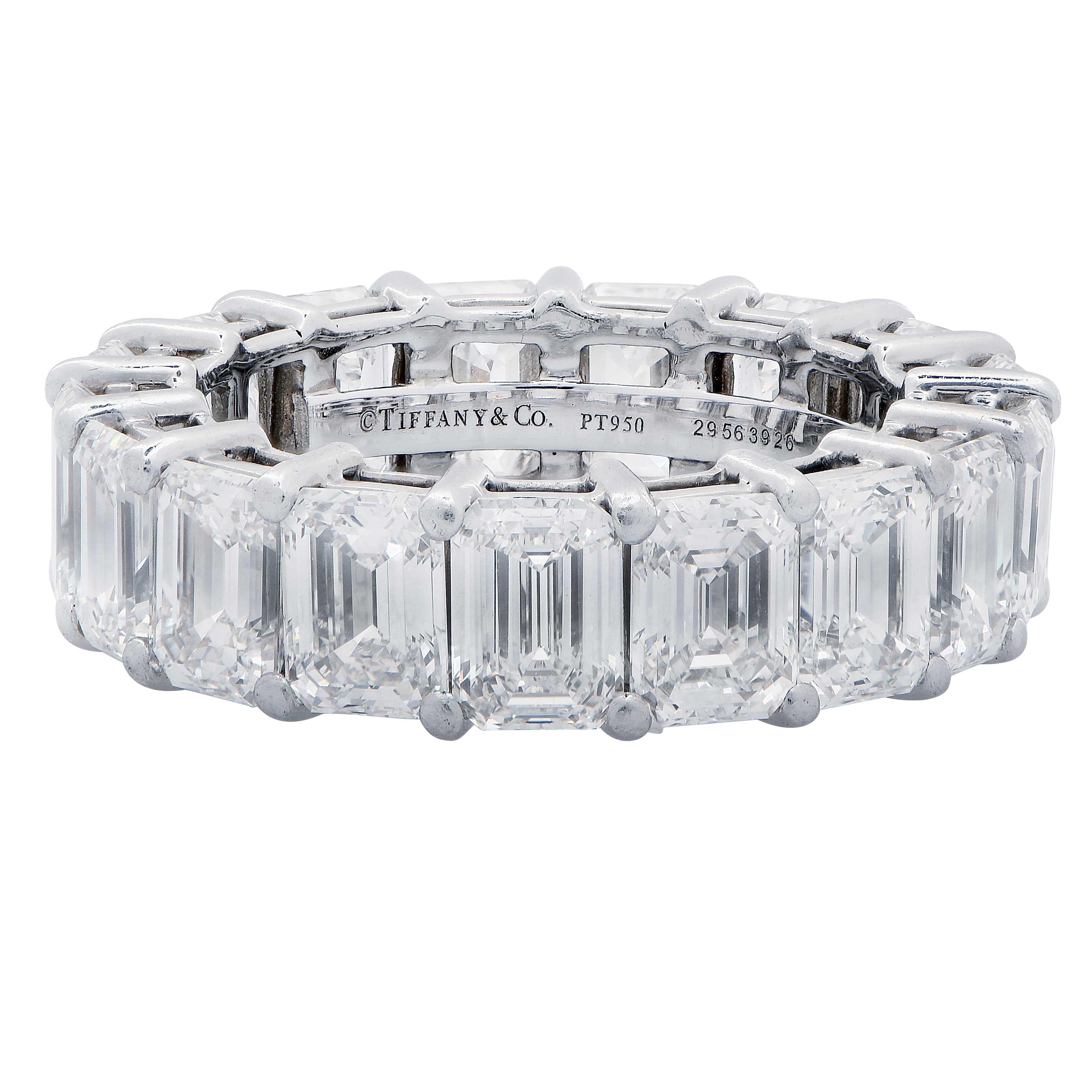 Tiffany and Company Platinum Diamond Eternity Band Ring features 17 Perfectly Matched Emerald Cut Diamonds with a Total Weight of 8.98 Carats.
Diamonds are G/H Color VVS2-VS1 clarity. 
Ring Size 6.
Tiffany and Company Estimated Replacement Value: