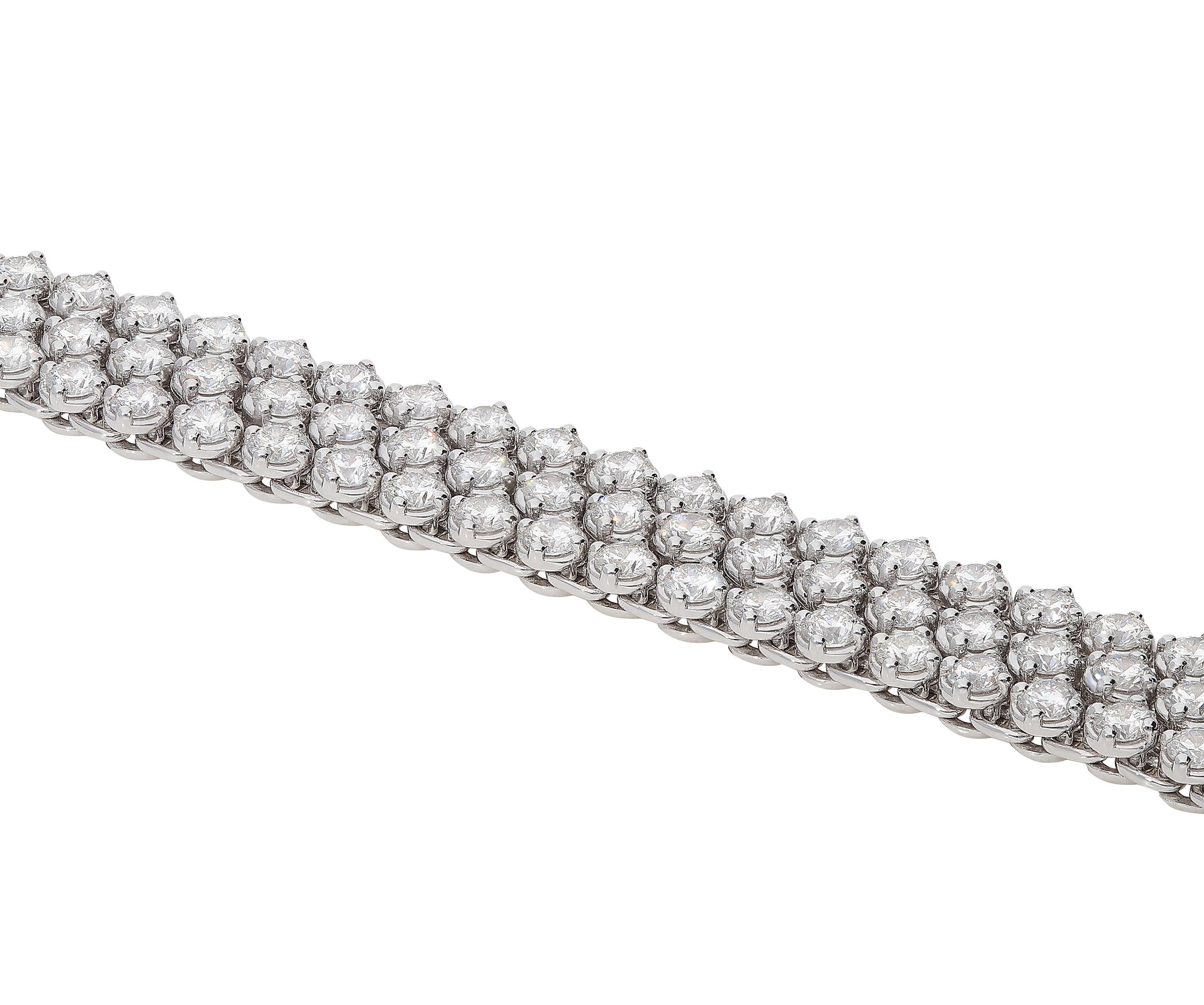 Round Cut 8.98 Carat White GVS Diamonds 18 Karat White Gold 3 Rows Tennis Bracelet For Sale